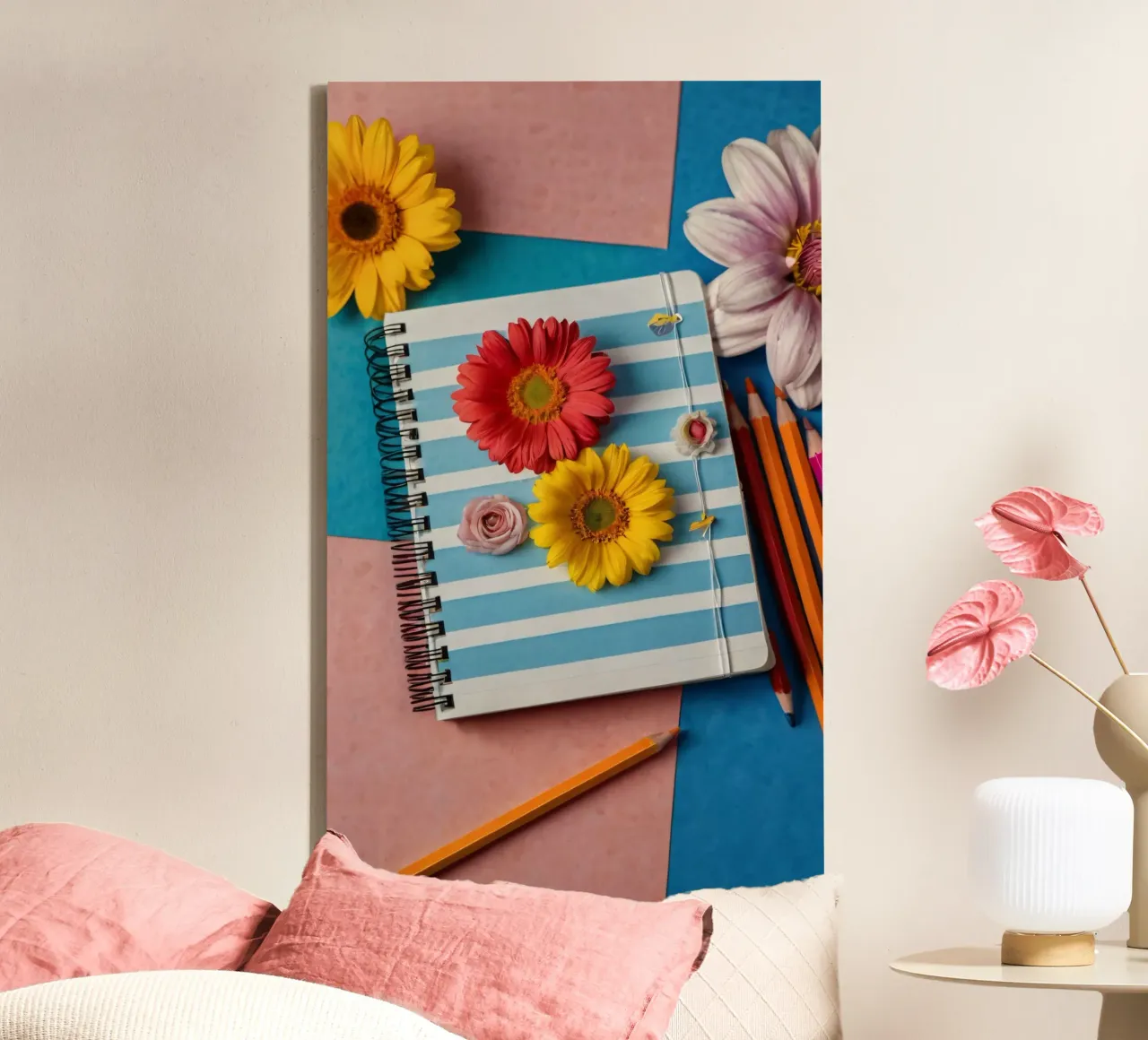 Colorful notebook adorned with flowers surrounded by pencils canvas by DesignDoodle