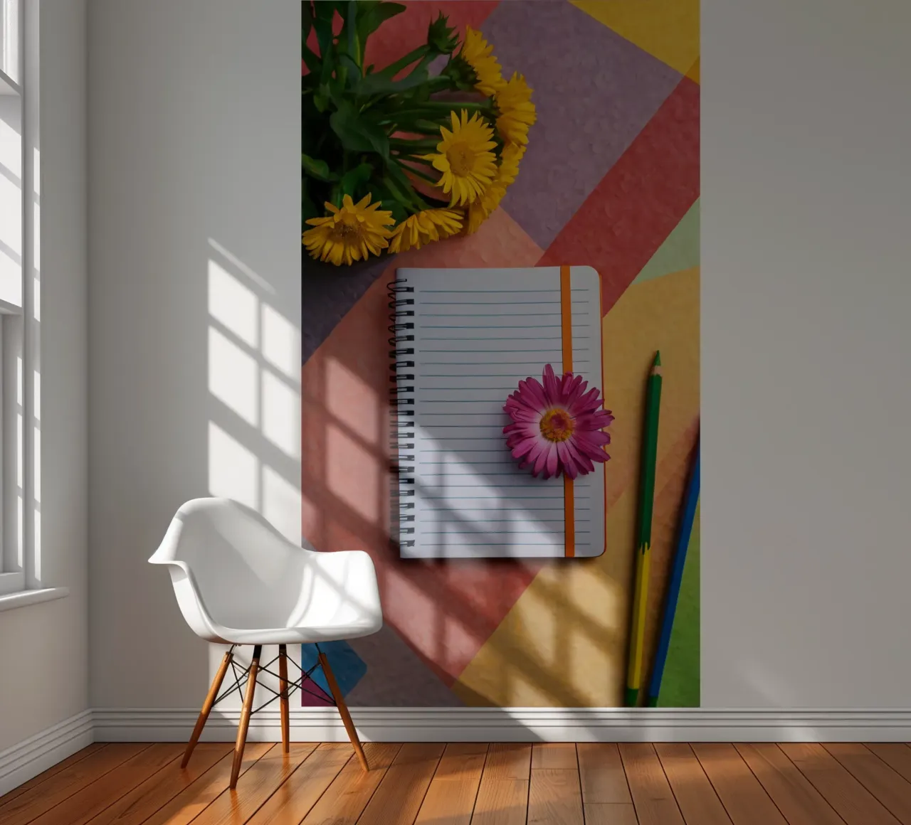 Espace de travail coloré comprenant un cahier avec une fleur papier peint photo de DesignDoodle