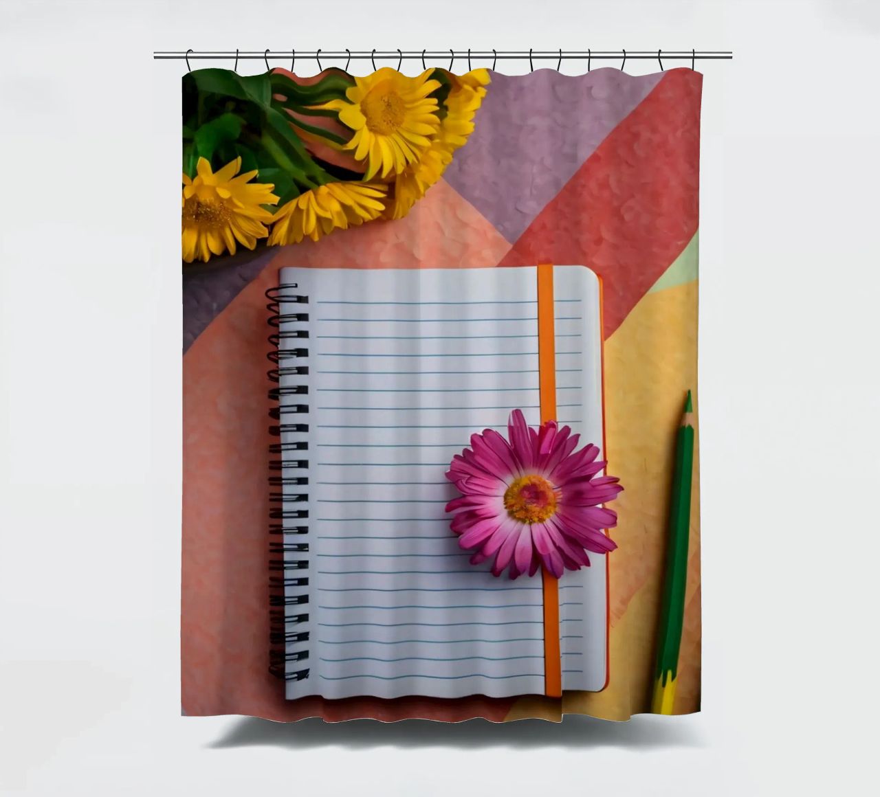 Uno spazio di lavoro colorato con un taccuino con un fiore tenda da doccia da DesignDoodle