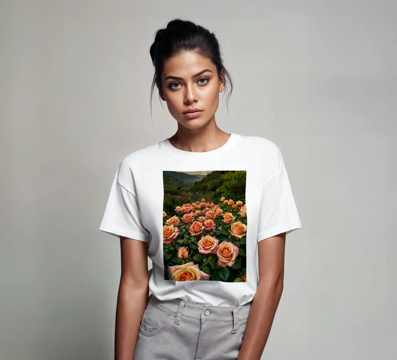 Un vivace campo di rose color pesca in fiore in una valle panoramica t-shirt da DesignDoodle