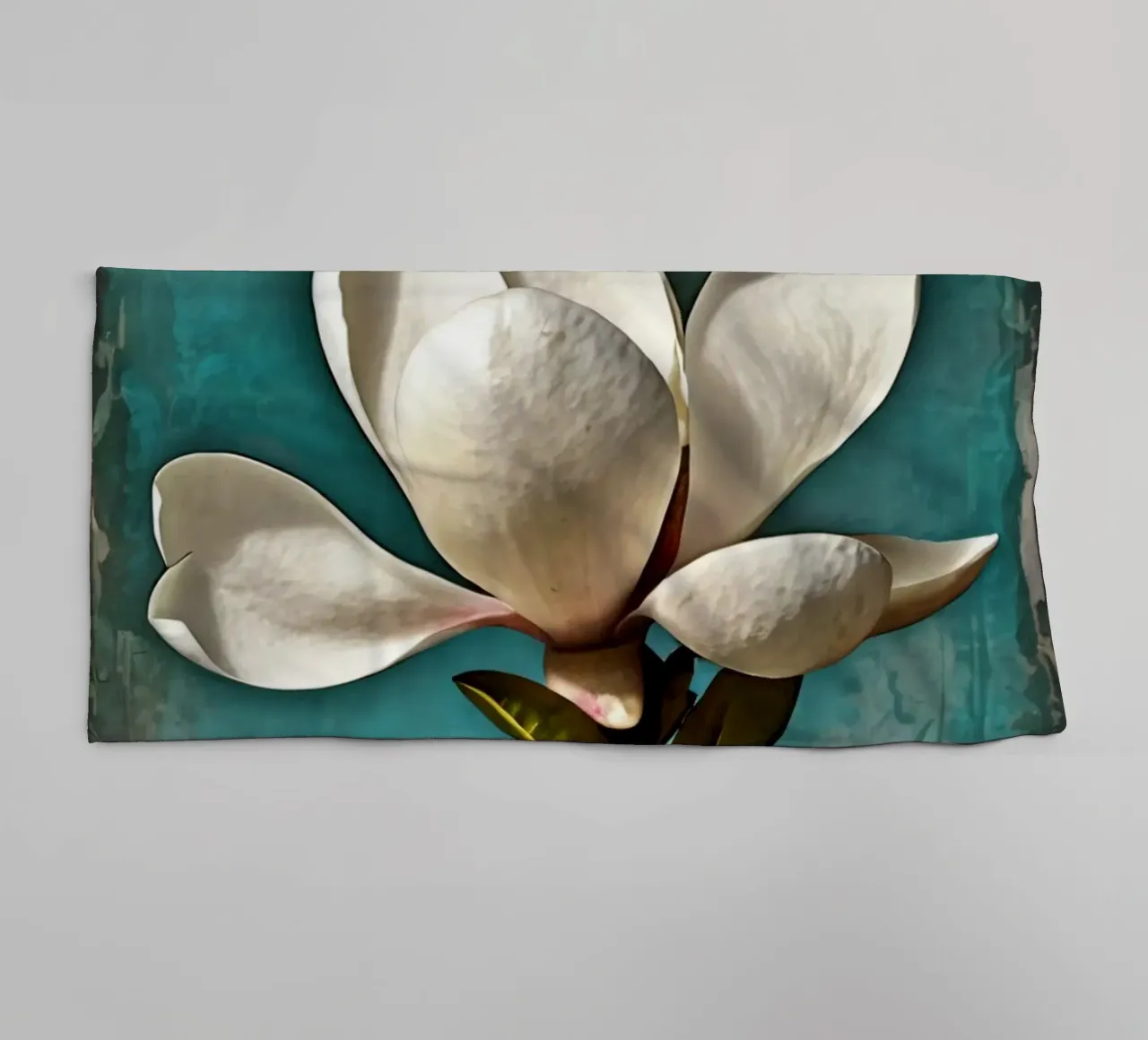 Elegant white magnolia blossom stands out against a textured towel by DesignDoodle