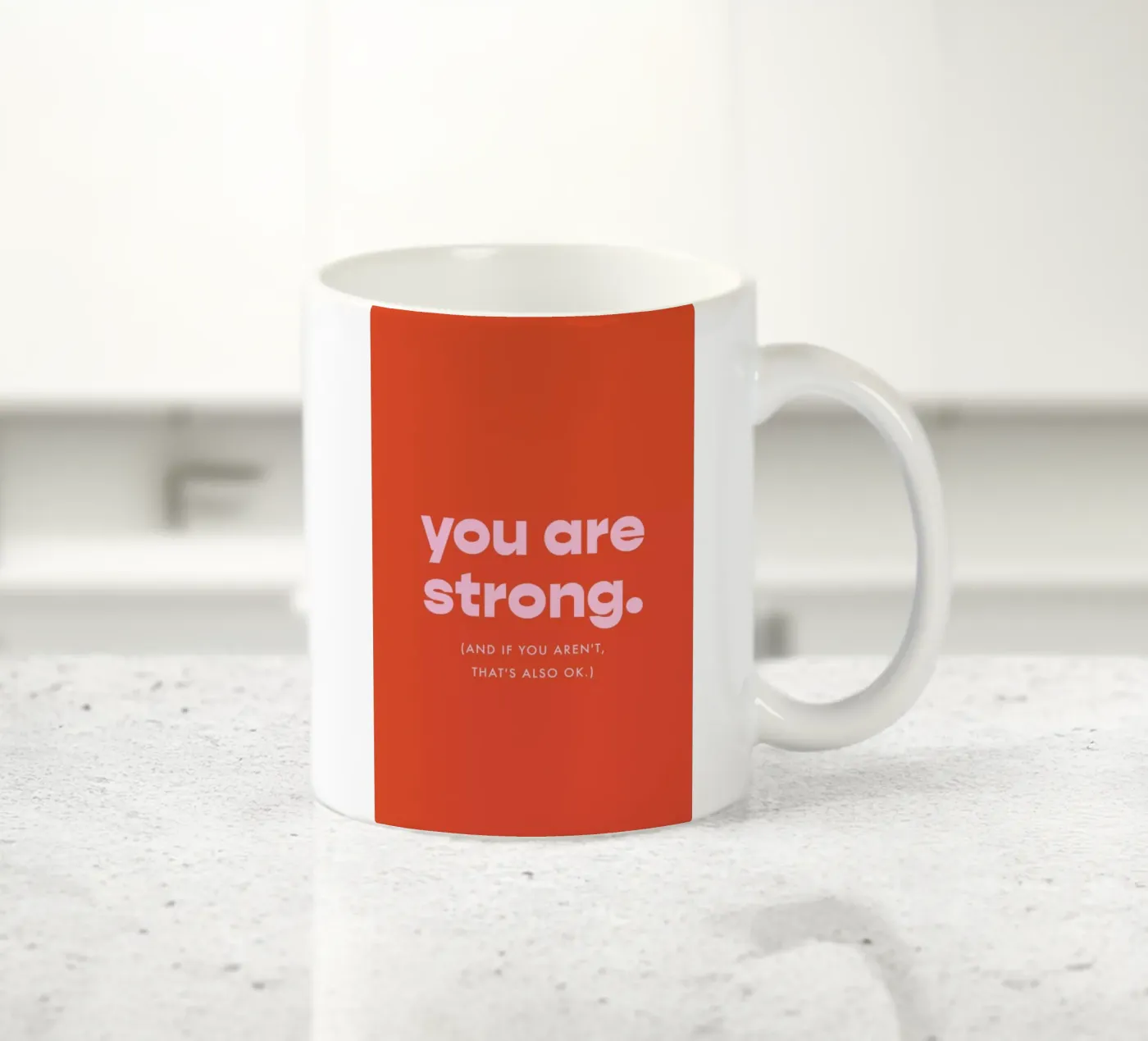 Strength ceramic mug by vonkopfbisfuss x JUNIQE