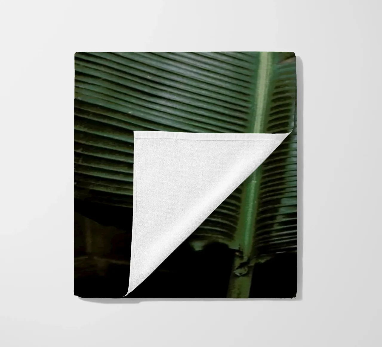 Leaves in Barcelona beach towel by Sebastian Hilgetag