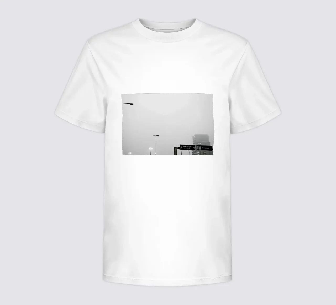 Reykjavík in the mist kids t-shirt by Nur Mut