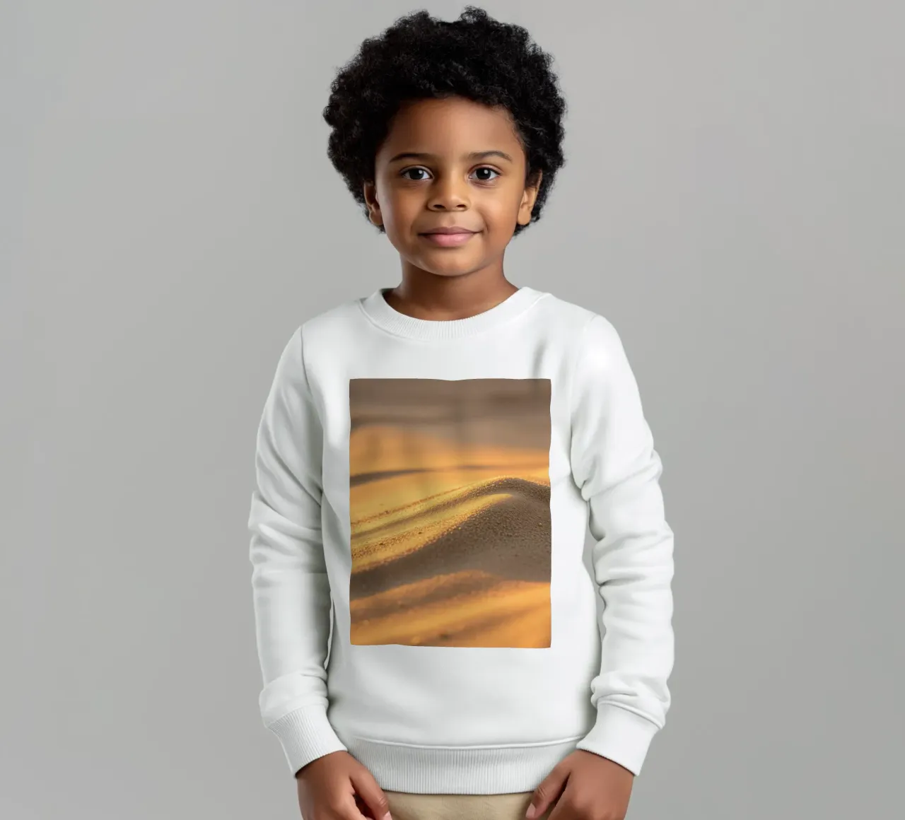 Superbe dessin de textures sableuses reflétant la lumière du soleil sweat enfant de DesignDoodle