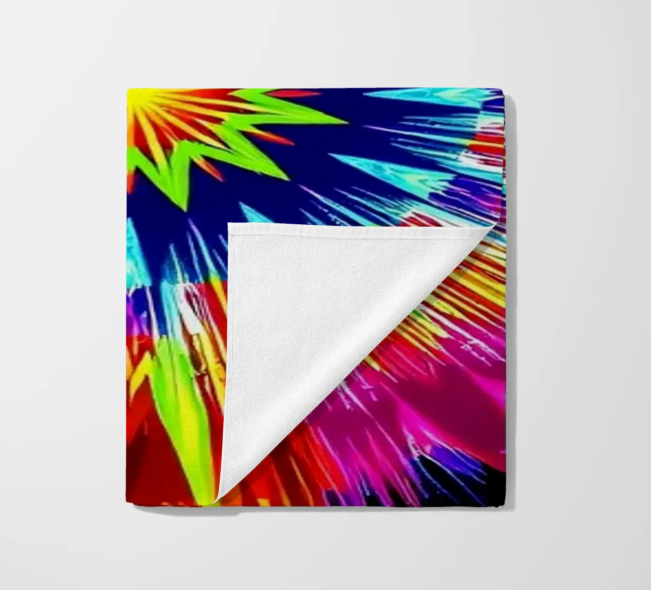 Vibrant abstract design with radial explosion of colors beach towel by DesignDoodle