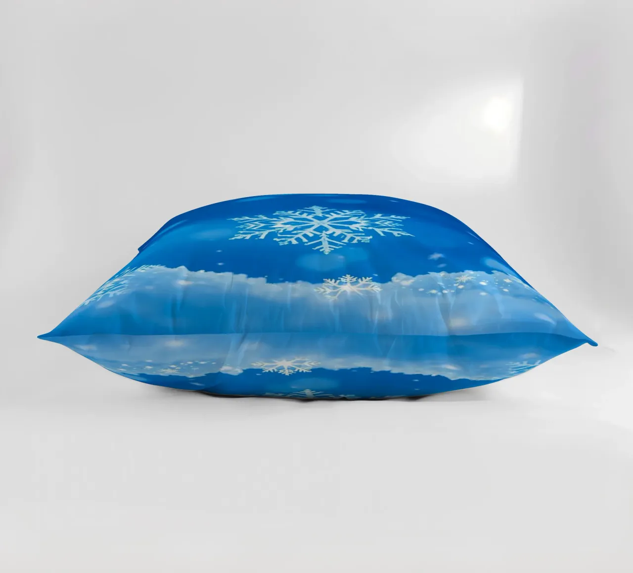 sfondo invernale con fiocchi di neve e un disegno blu. cuscino da DesignDoodle