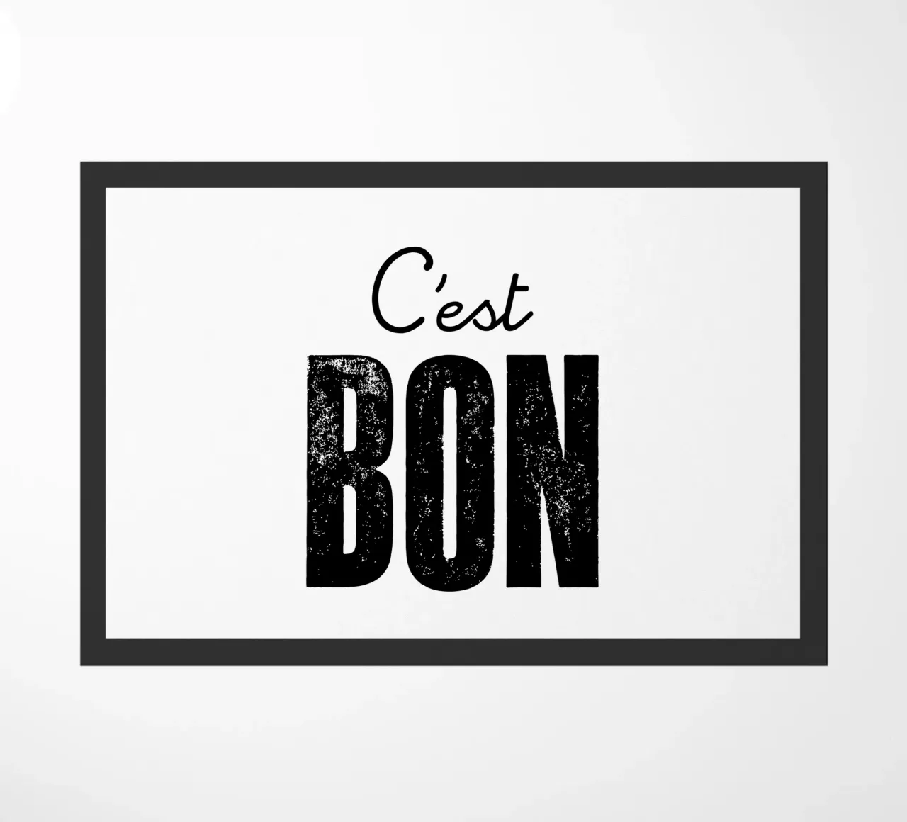 C'est Bon Design tipografico francese in bianco e nero zerbino da THE MOTIVATED TYPE