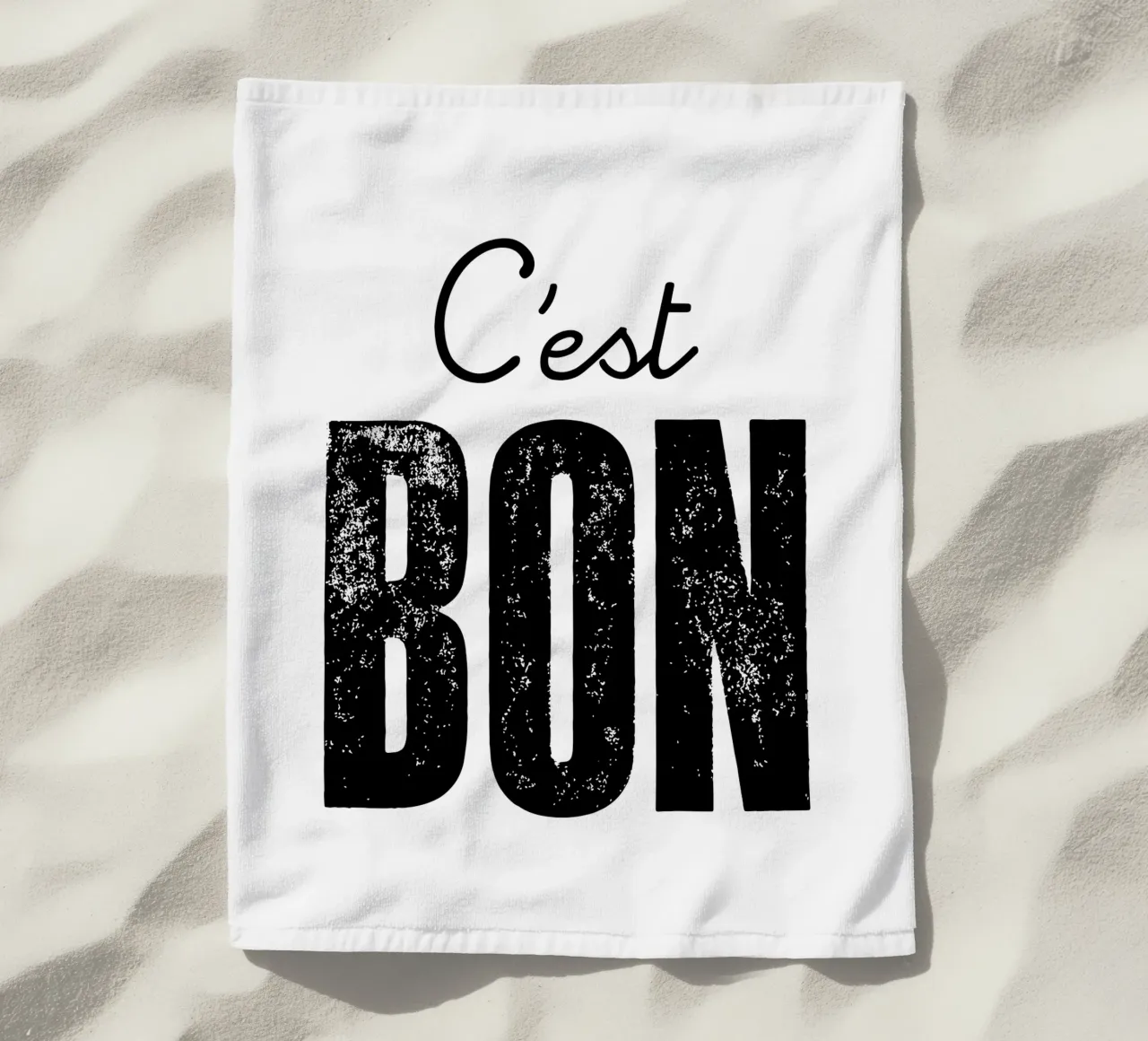 C'est Bon Design tipografico francese in bianco e nero telo mare da THE MOTIVATED TYPE