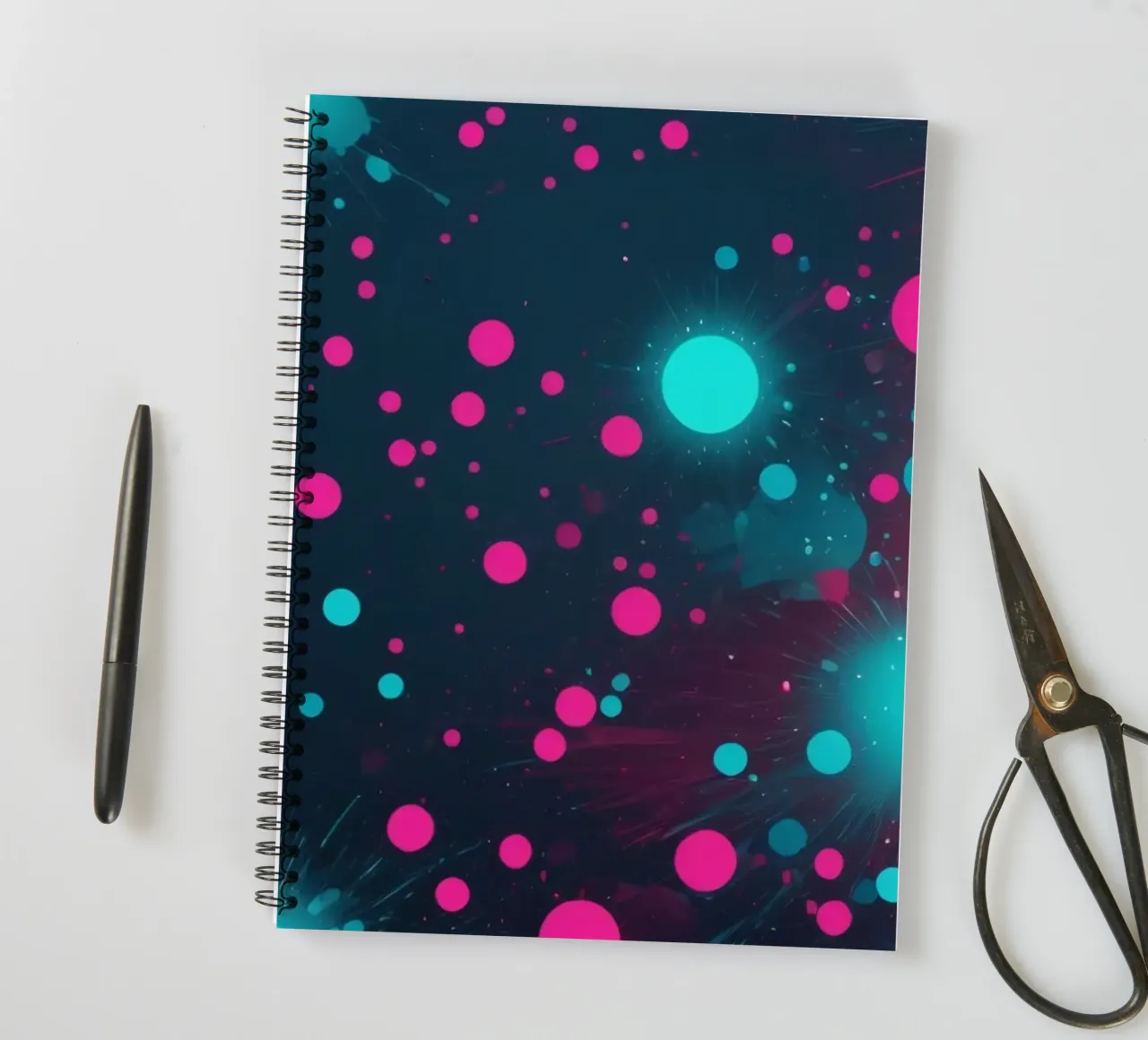 Vibrant abstract design featuring dynamic circles and radian spiral notebook by DesignDoodle