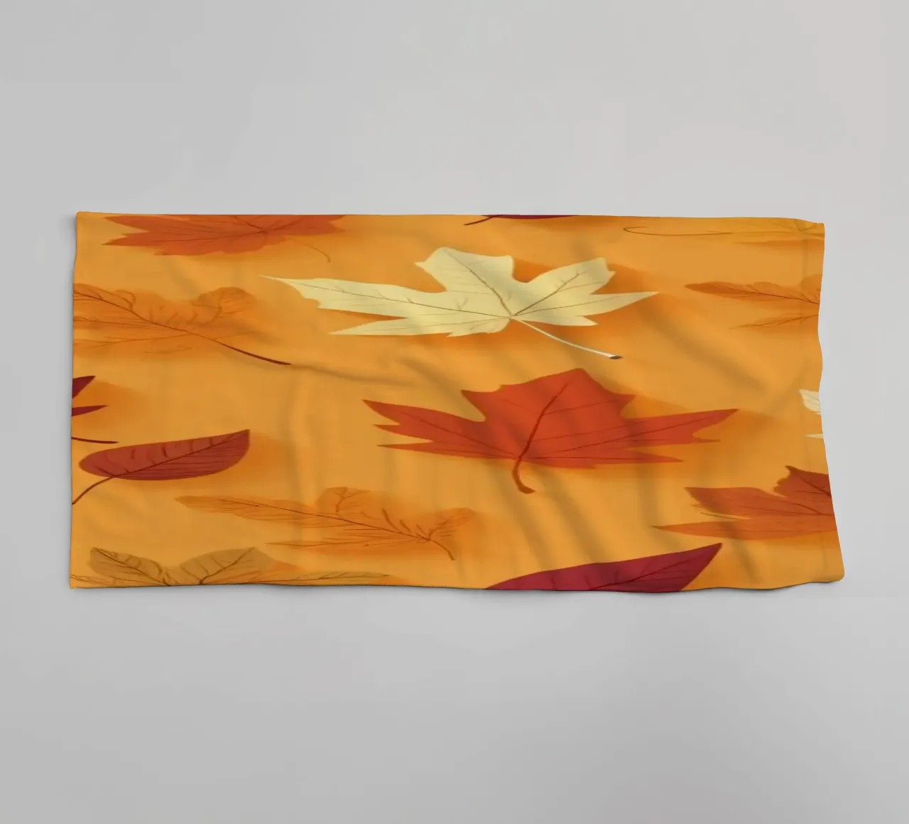 Colorful autumn leaves scattered, vibrant orange backdrop towel by DesignDoodle