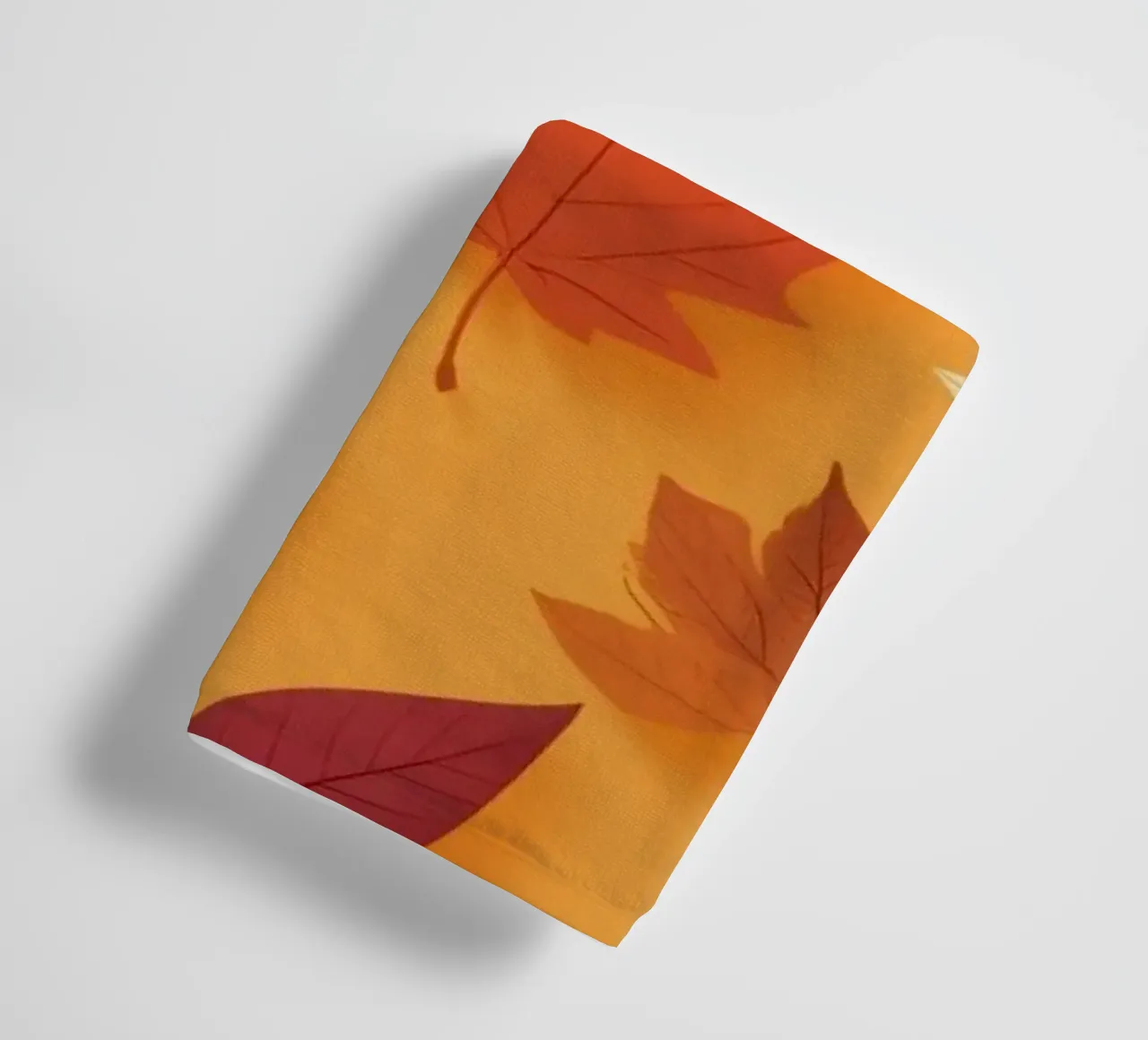 Colorful autumn leaves scattered, vibrant orange backdrop towel by DesignDoodle
