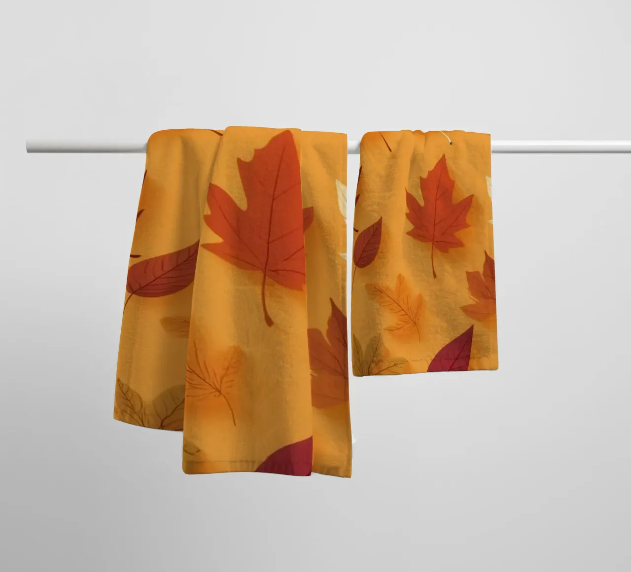 Colorful autumn leaves scattered, vibrant orange backdrop towel by DesignDoodle