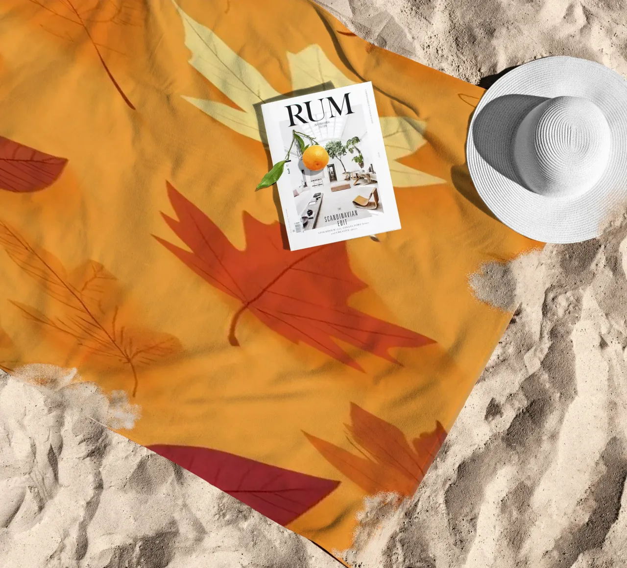 Colorful autumn leaves scattered, vibrant orange backdrop beach towel by DesignDoodle