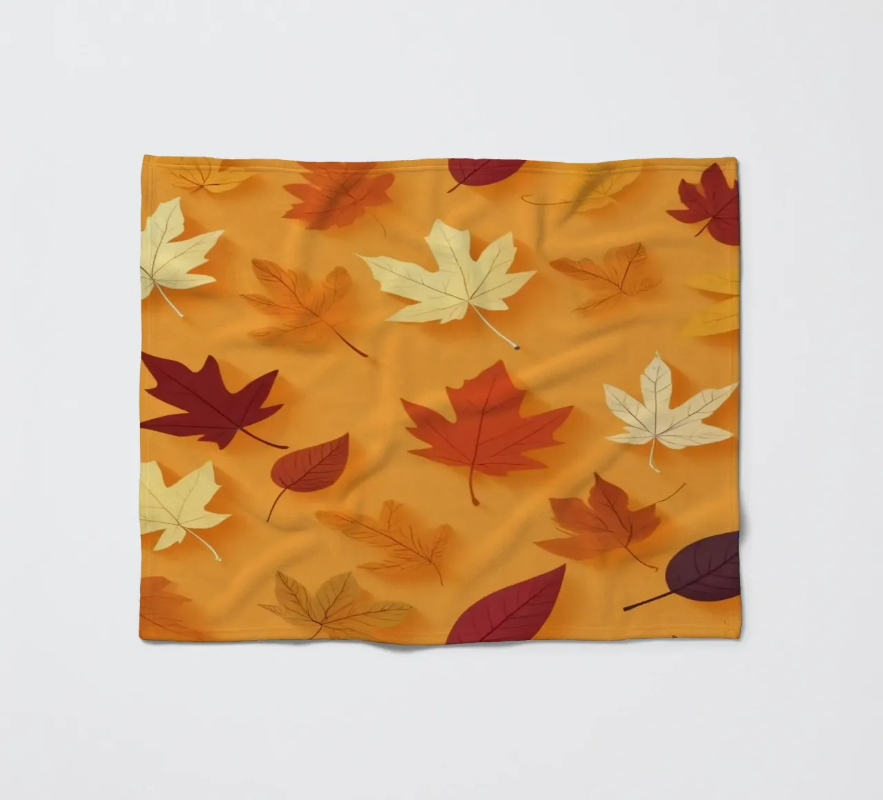 Foglie autunnali colorate sparse, sfondo arancione vibrante coperta in pile da DesignDoodle