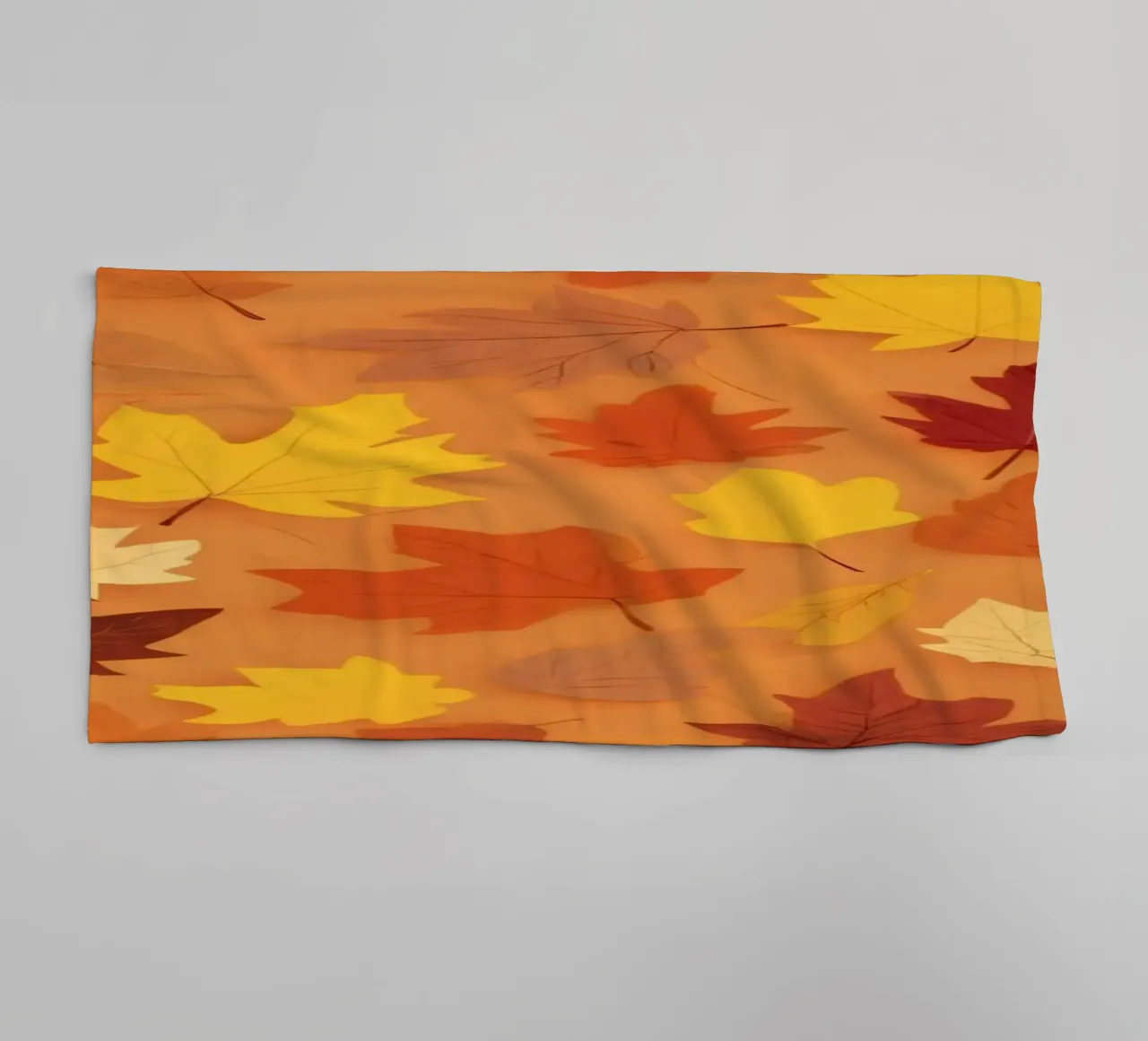 autumn leaves create an abstract background design towel by DesignDoodle