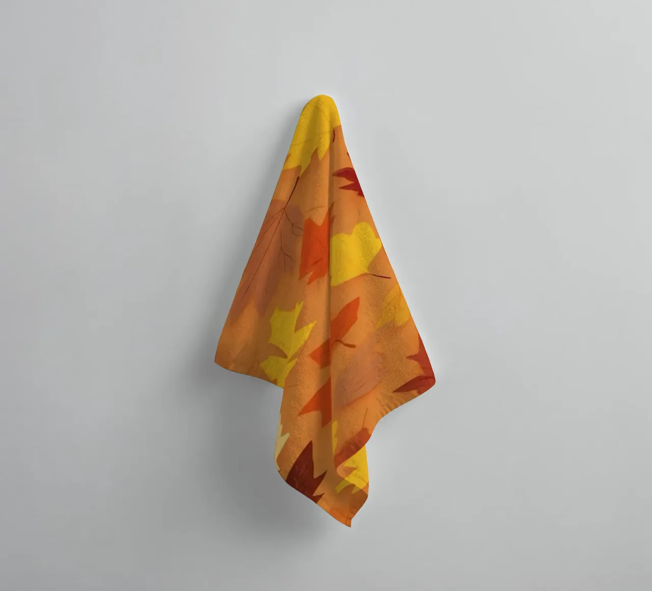 autumn leaves create an abstract background design towel by DesignDoodle