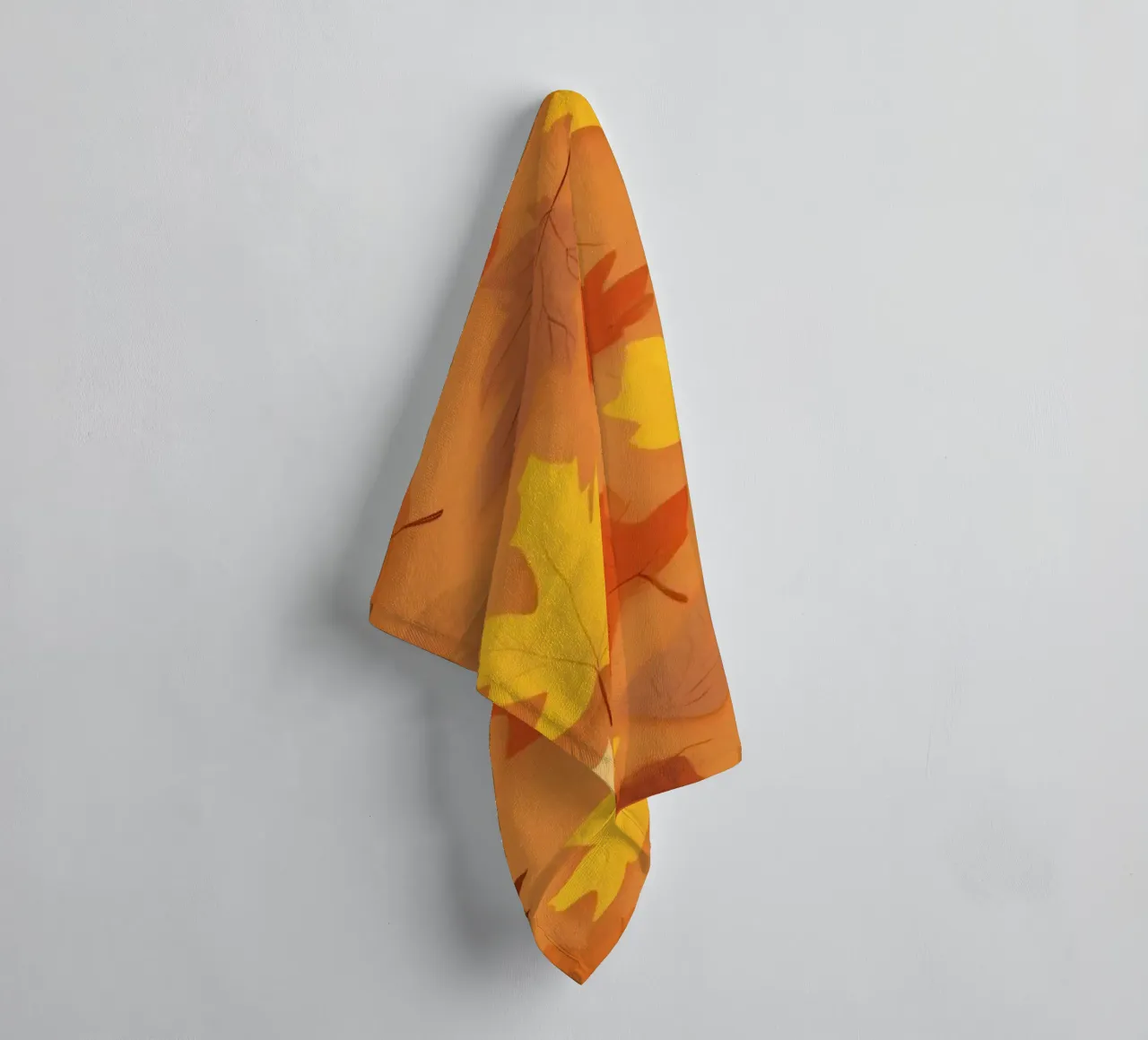 autumn leaves create an abstract background design towel by DesignDoodle