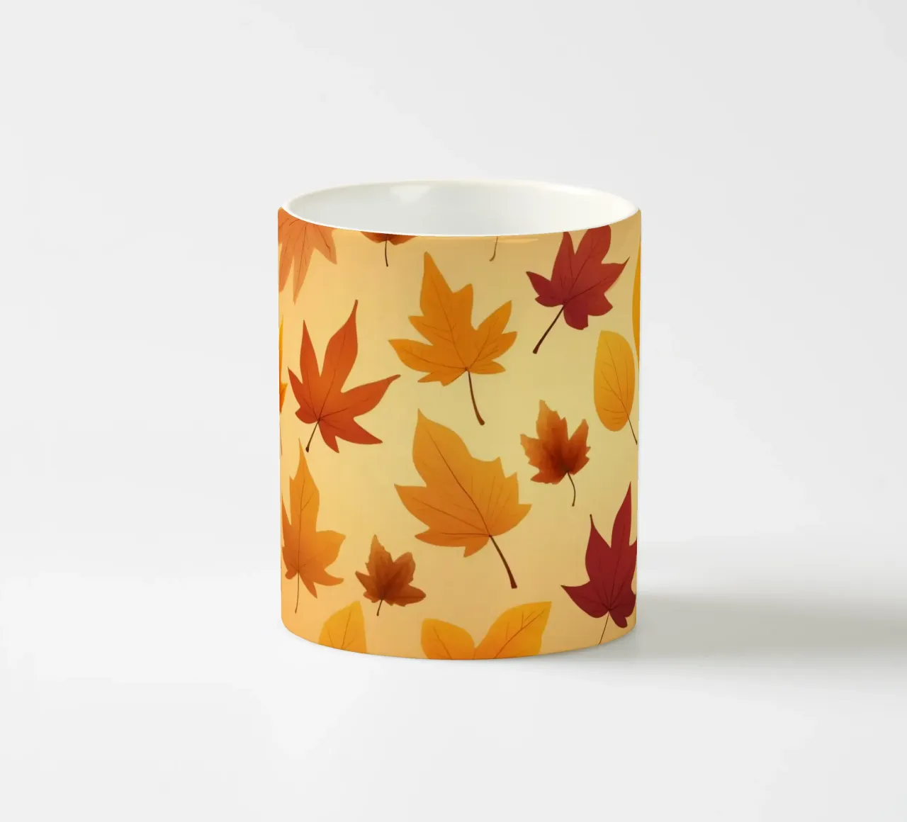 autumn leaves in warm hues creating an abstract background ceramic mug by DesignDoodle