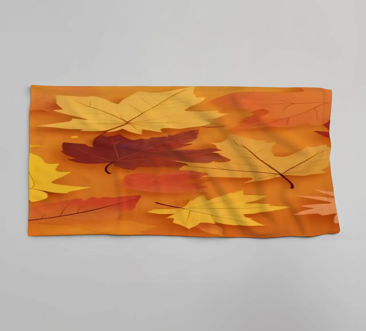 feuilles d'automne formant un motif abstrait sur un orange chaud serviette de bain de DesignDoodle
