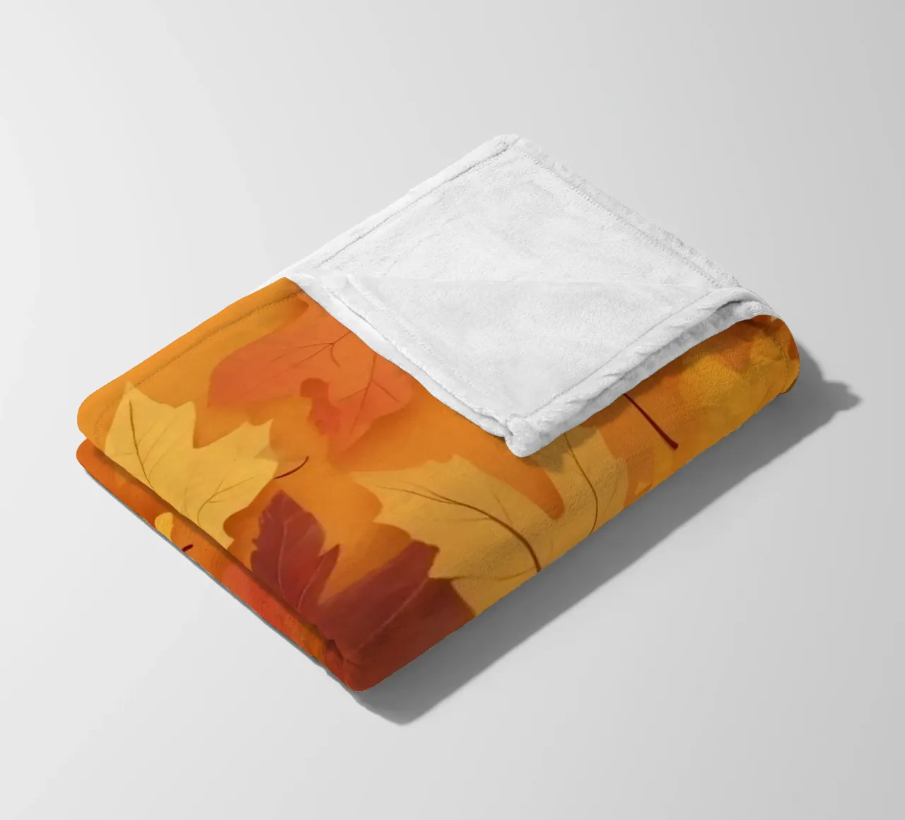 autumn leaves forming an abstract pattern on a warm orange fleece blanket by DesignDoodle