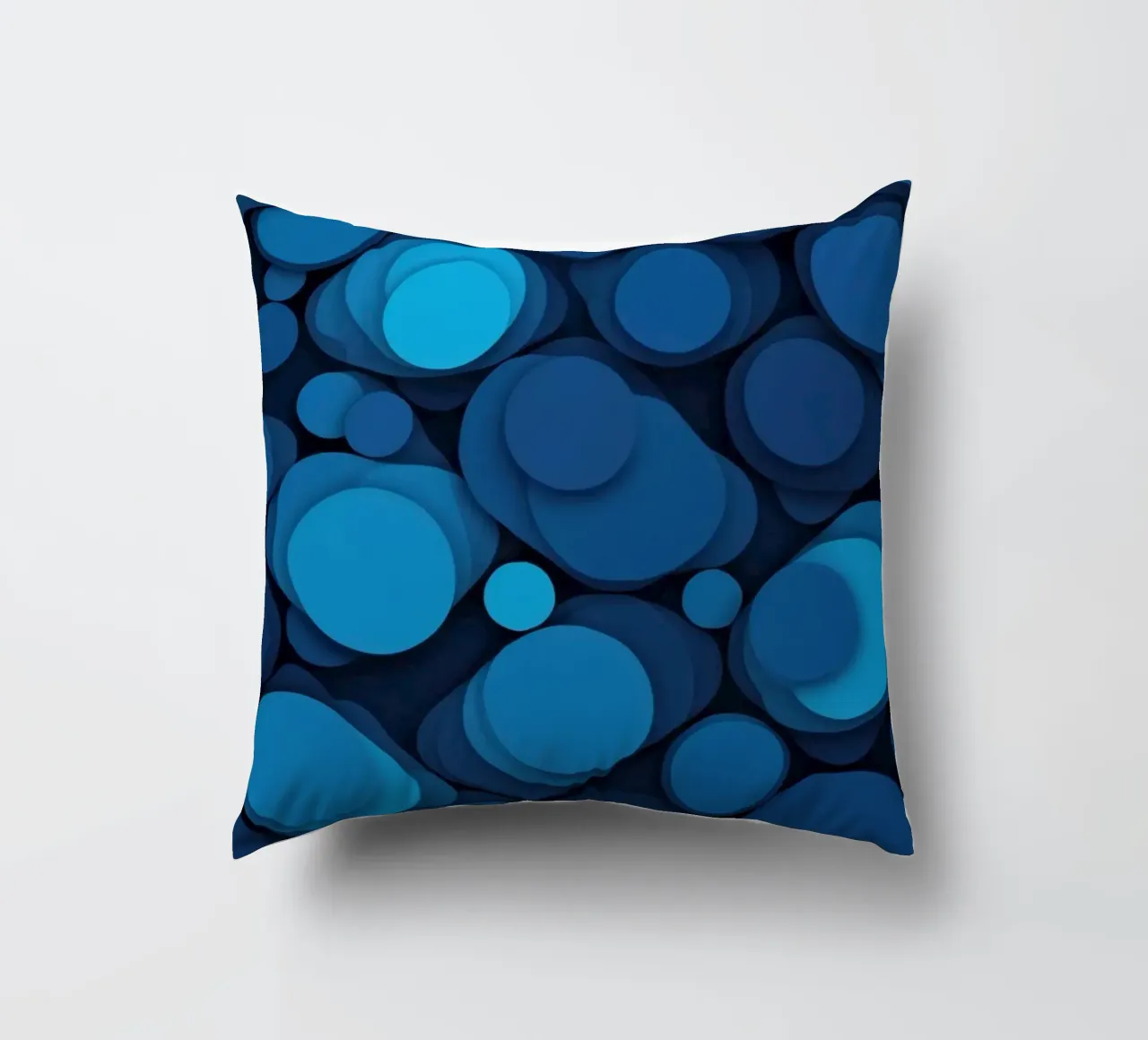 abstract design featuring layered blue circles decorative cushion by DesignDoodle