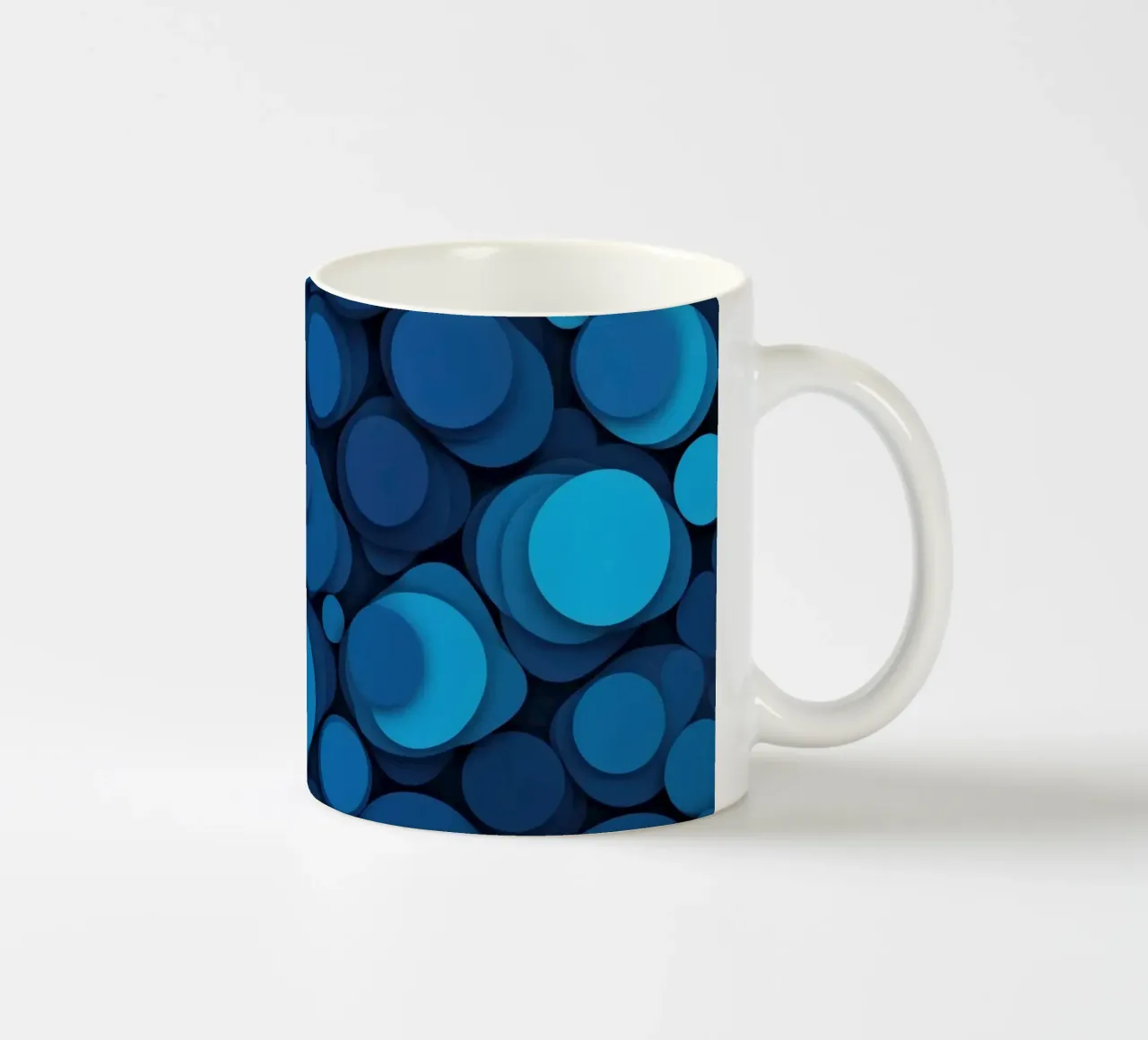 abstract design featuring layered blue circles ceramic mug by DesignDoodle