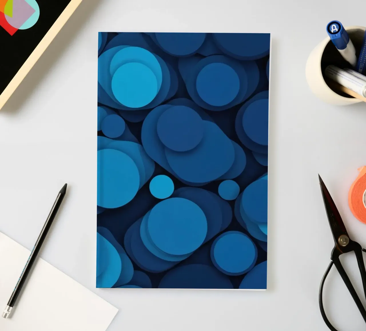 abstract design featuring layered blue circles notebook by DesignDoodle