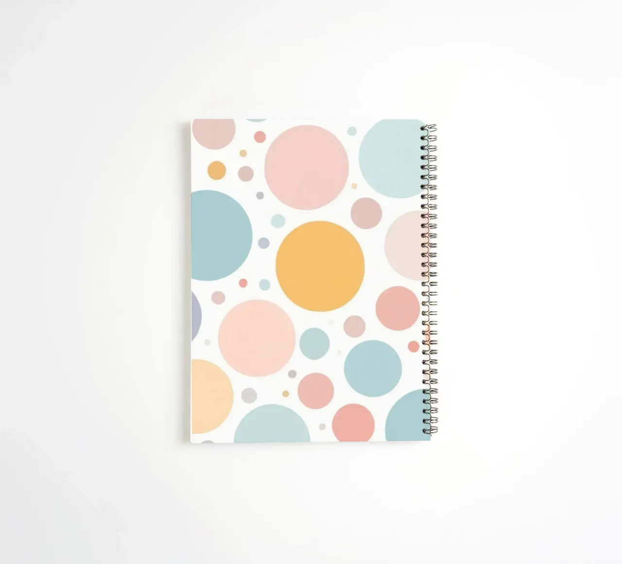 abstract design with pastel colored circles and dots spiral notebook by DesignDoodle