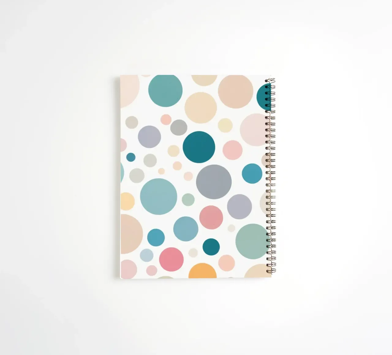 circles create a lively wallpaper design featuring soft tone spiral notebook by DesignDoodle