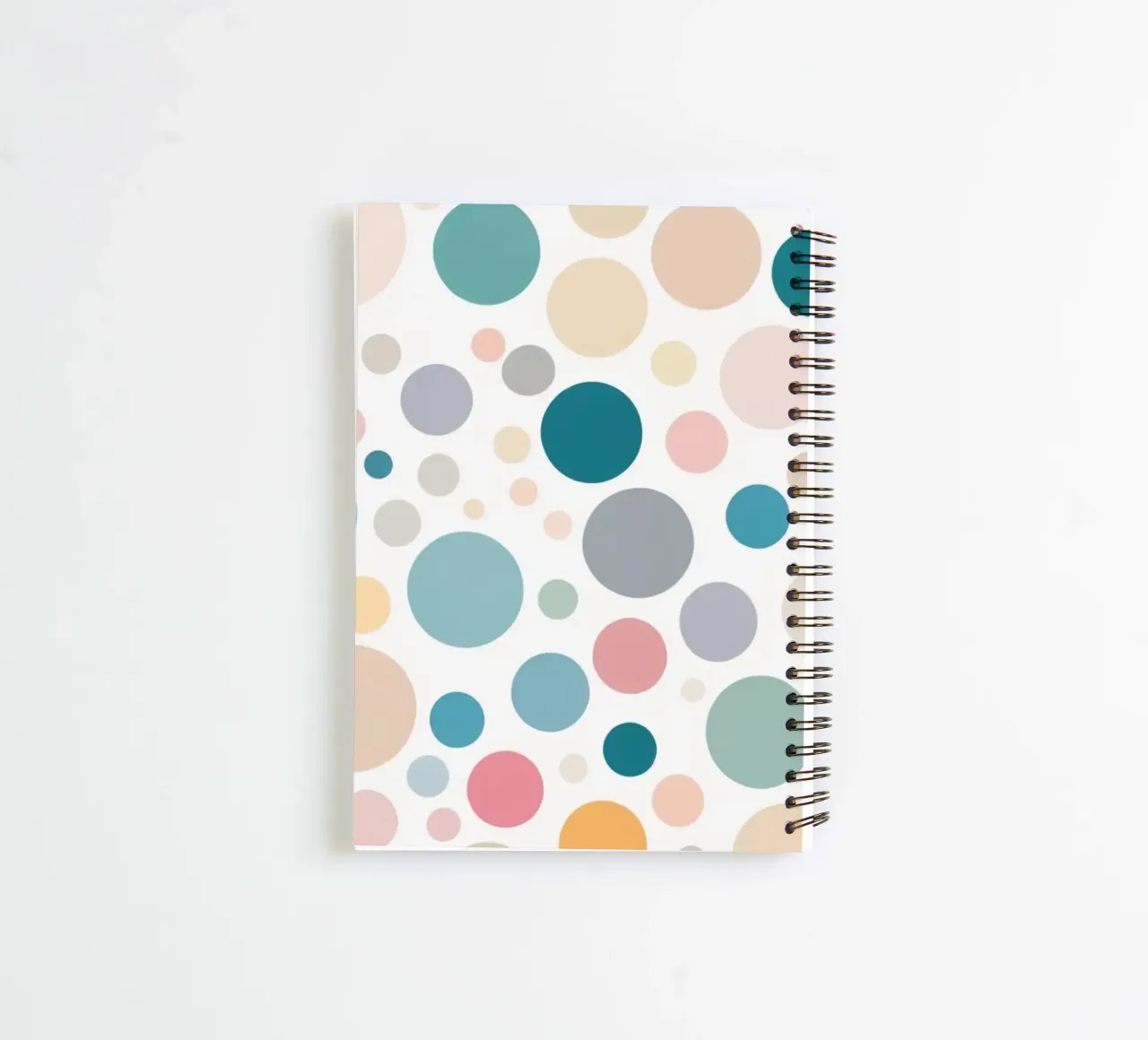 circles create a lively wallpaper design featuring soft tone spiral notebook by DesignDoodle
