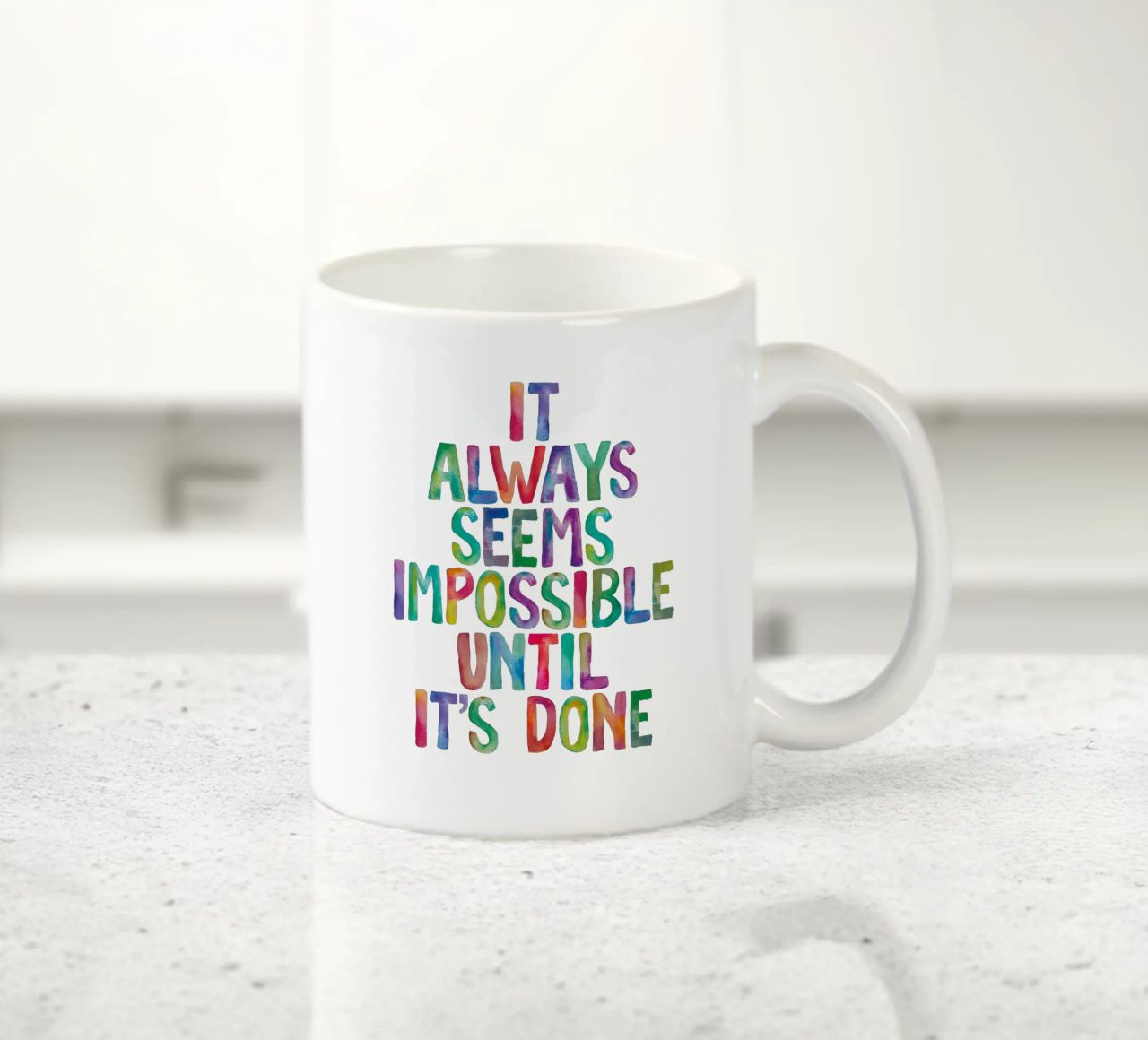 It Always Seems Impossible Until It's Done Regenbogen Design ceramic mug by THE MOTIVATED TYPE