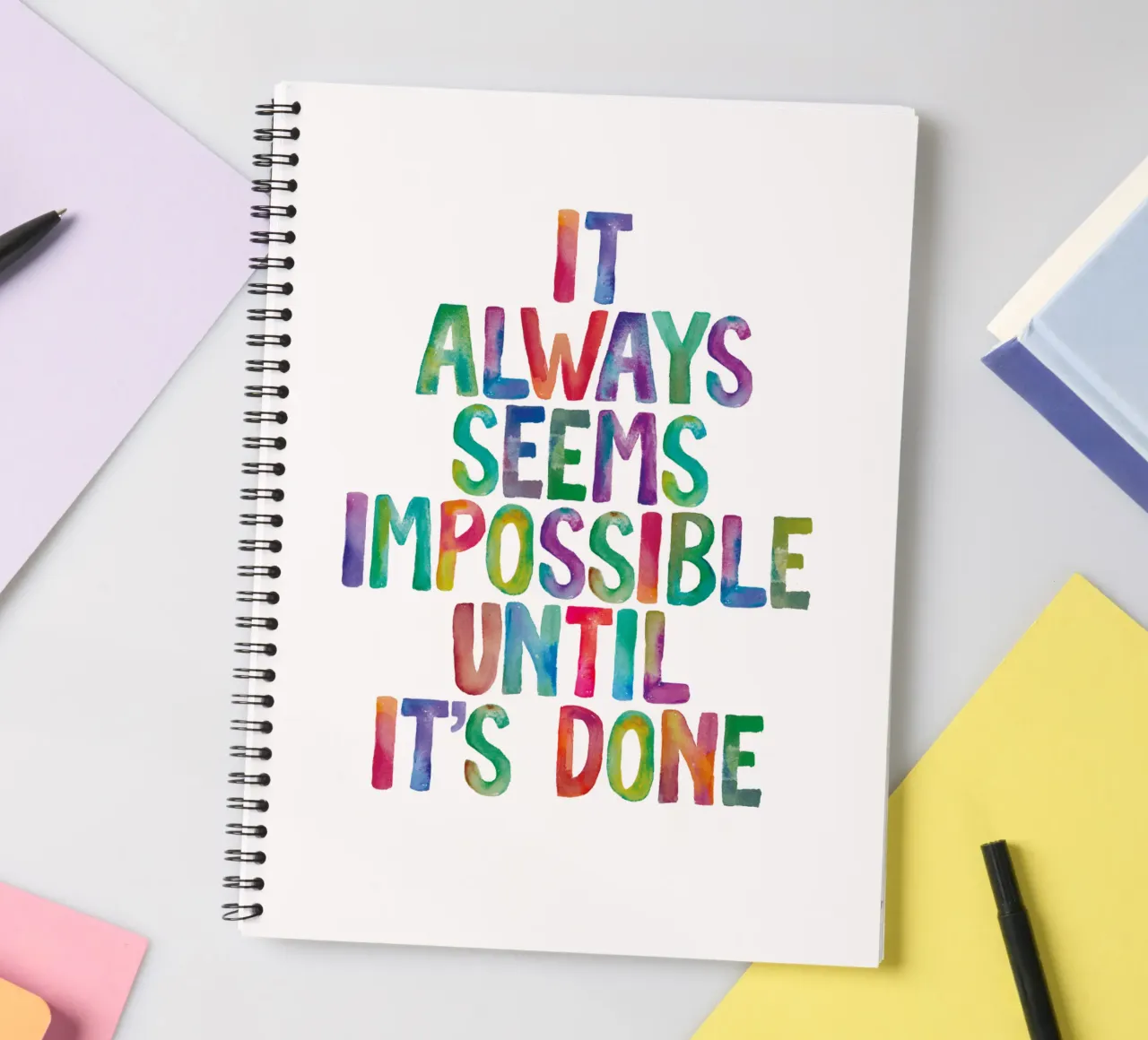It Always Seems Impossible Until It's Done Regenbogen Design spiral notebook by THE MOTIVATED TYPE
