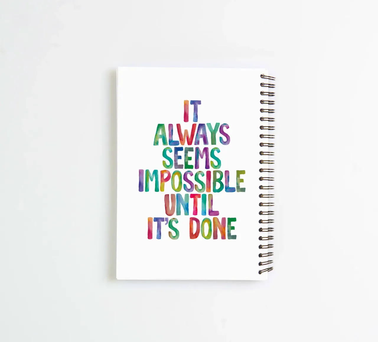 It Always Seems Impossible Until It's Done Regenbogen Design spiral notebook by THE MOTIVATED TYPE