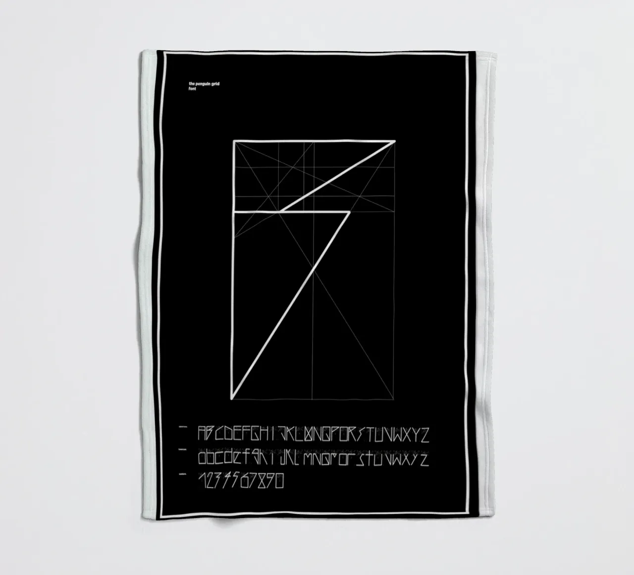Penguin Grid Font plaid polaire de Marcin Plonka
