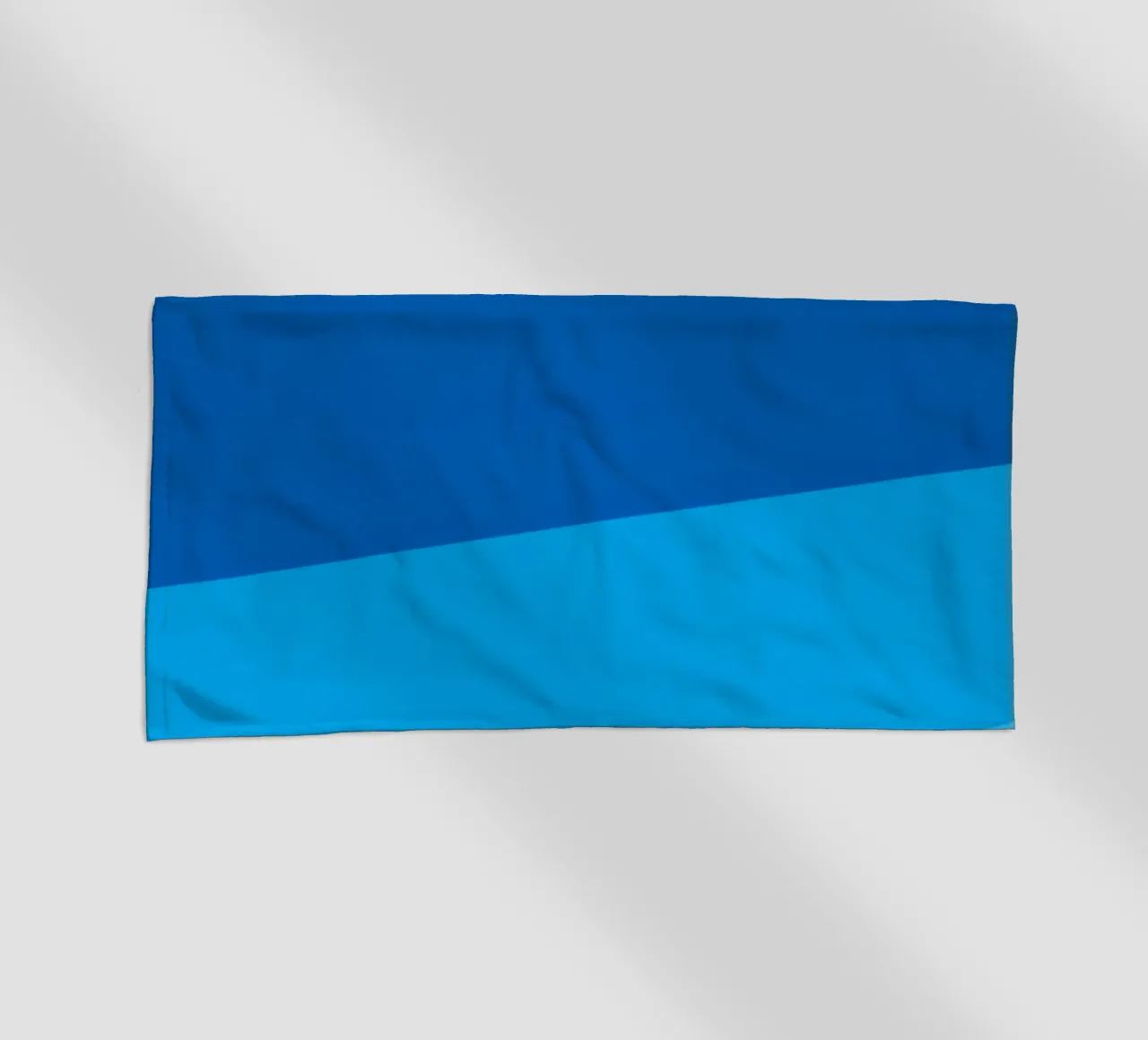 abstract blue design provides a captivating backdrop beach towel by DesignDoodle