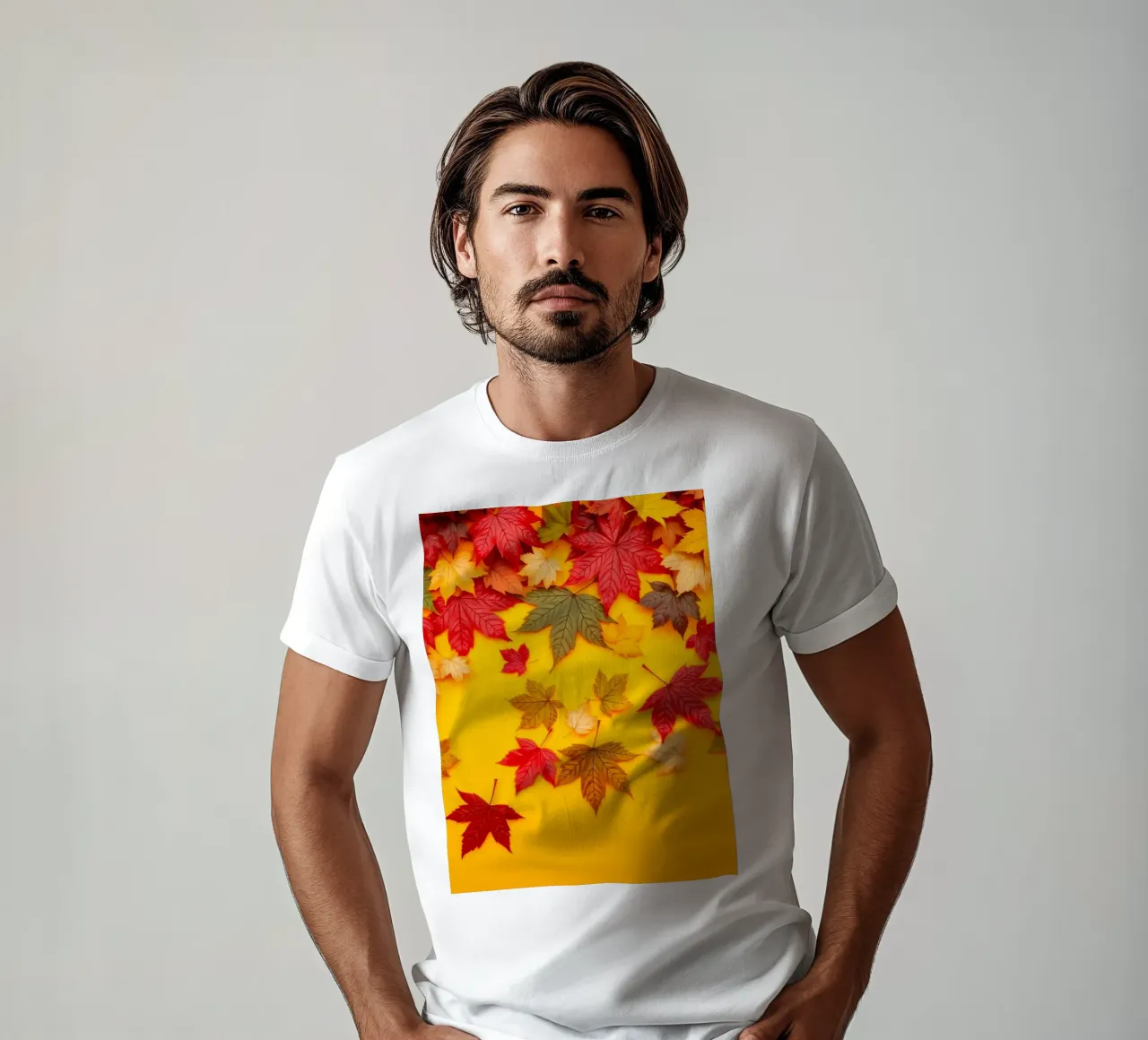 feuilles d'automne dispersées sur un fond jaune chaud t-shirt de DesignDoodle