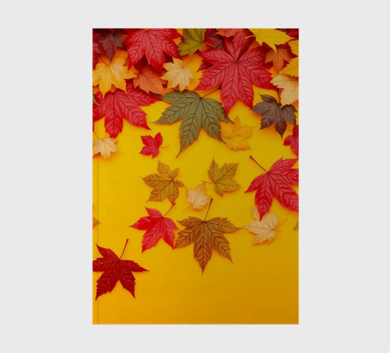 feuilles d'automne dispersées sur un fond jaune chaud carnet de notes de DesignDoodle