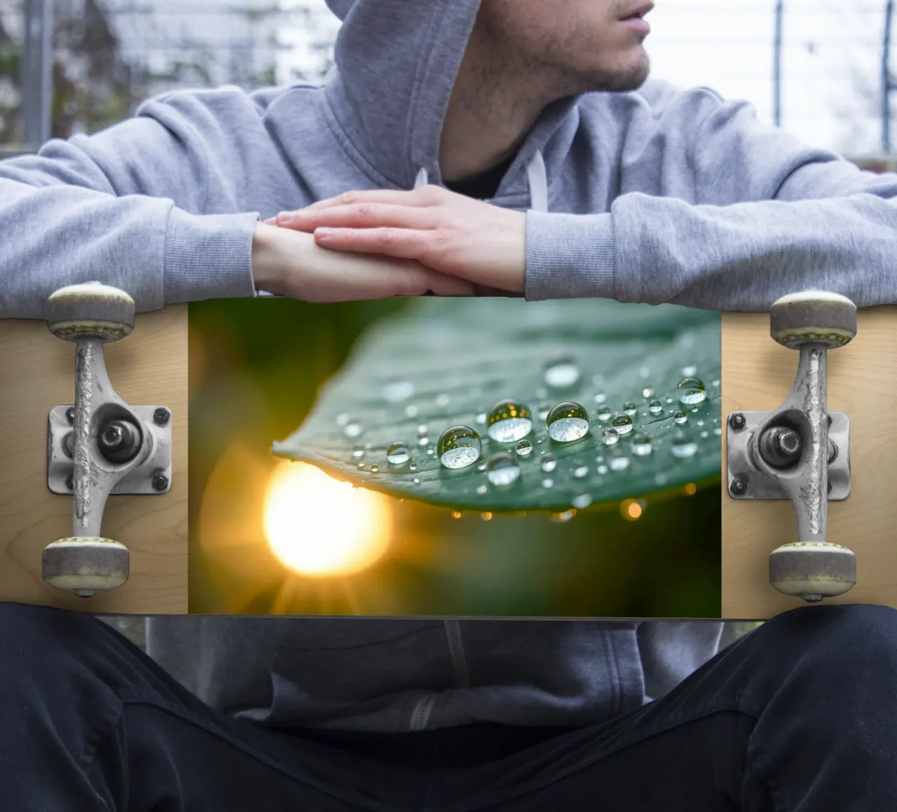 Close-up view of water droplets on a green leaf sticker by DesignDoodle