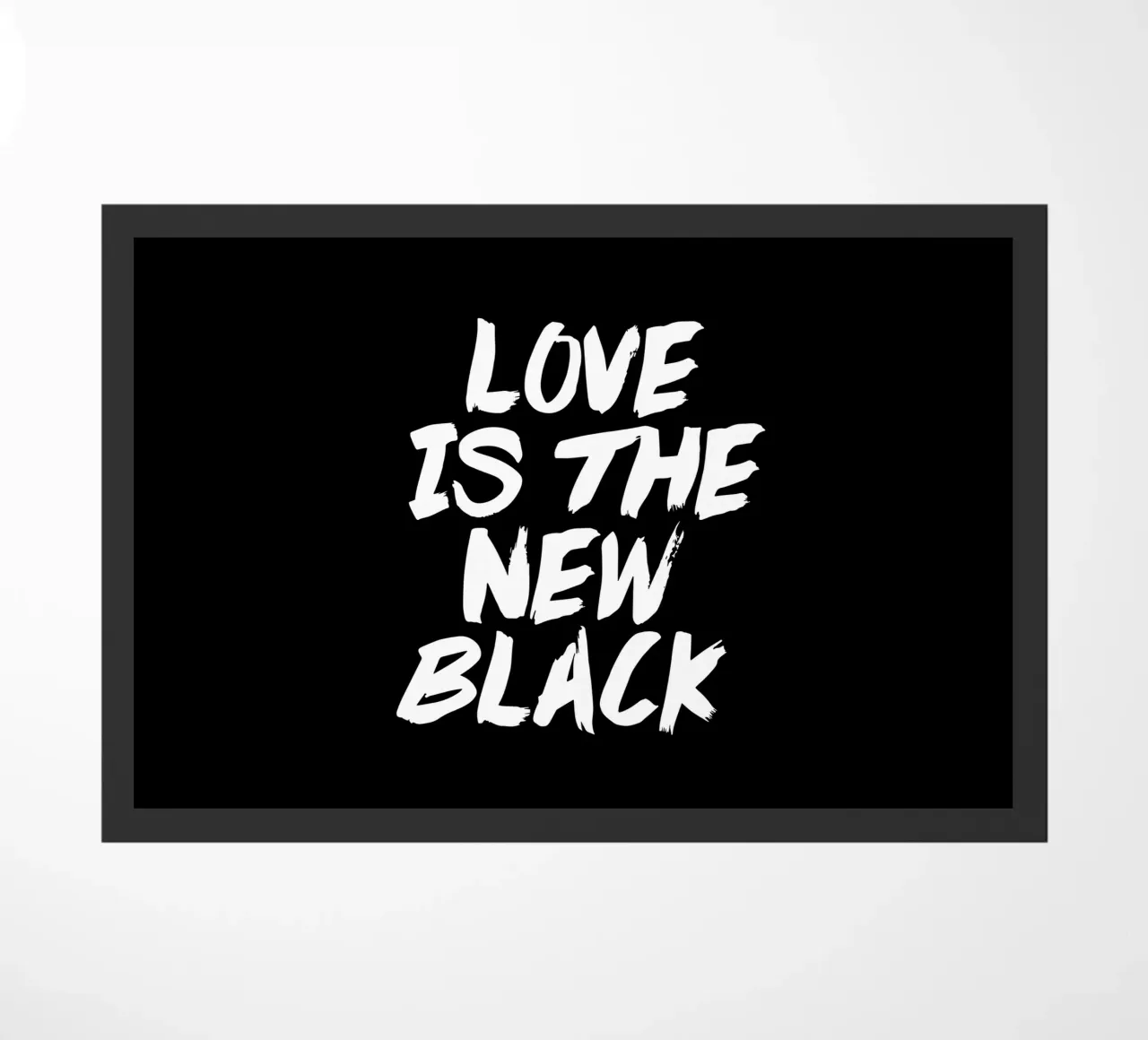 Love Is The New Black Design tipografico in bianco e nero zerbino da THE MOTIVATED TYPE