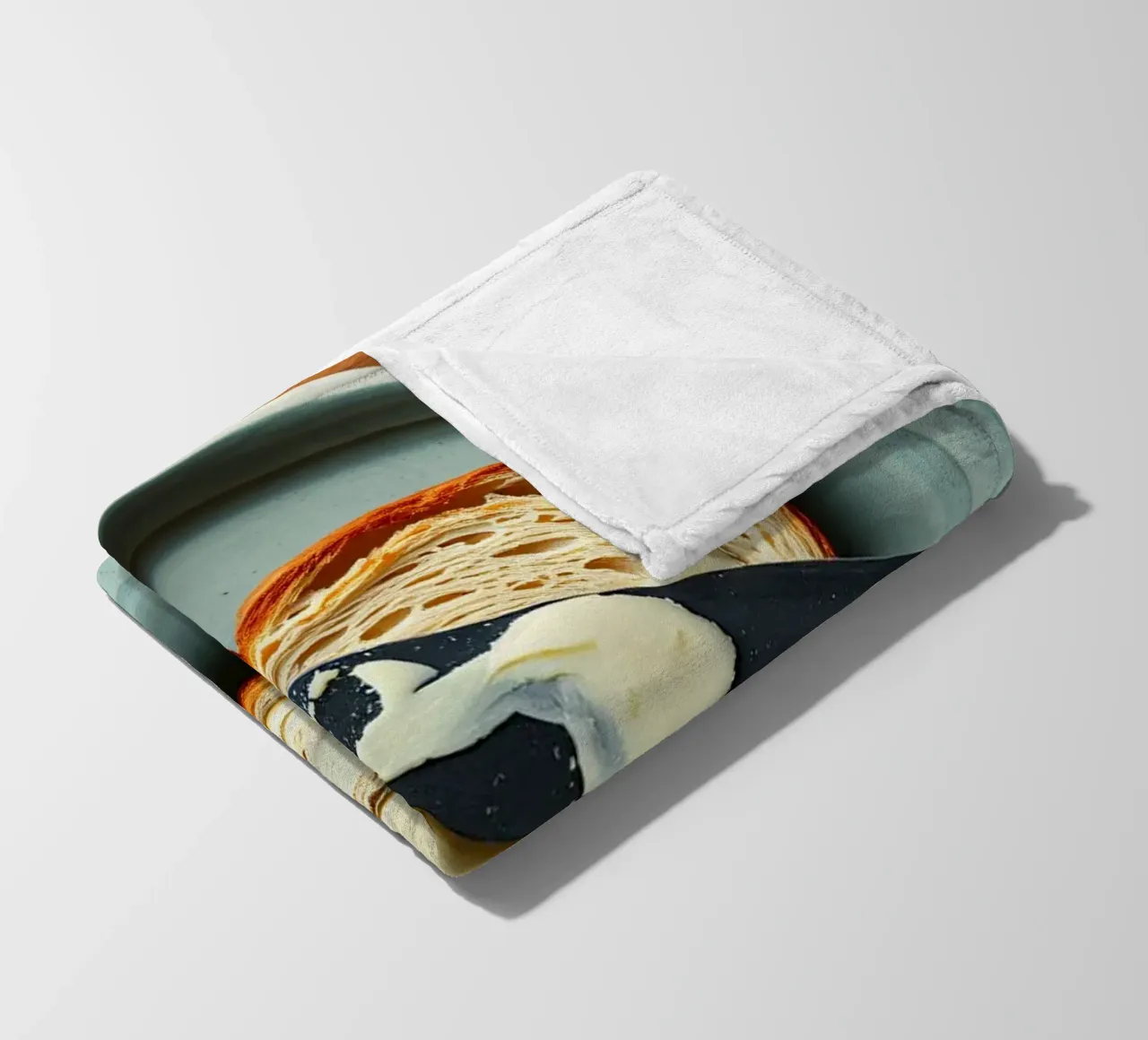 Slicing bread and spreading butter on a plate in a cozy kitc fleece blanket by DesignDoodle