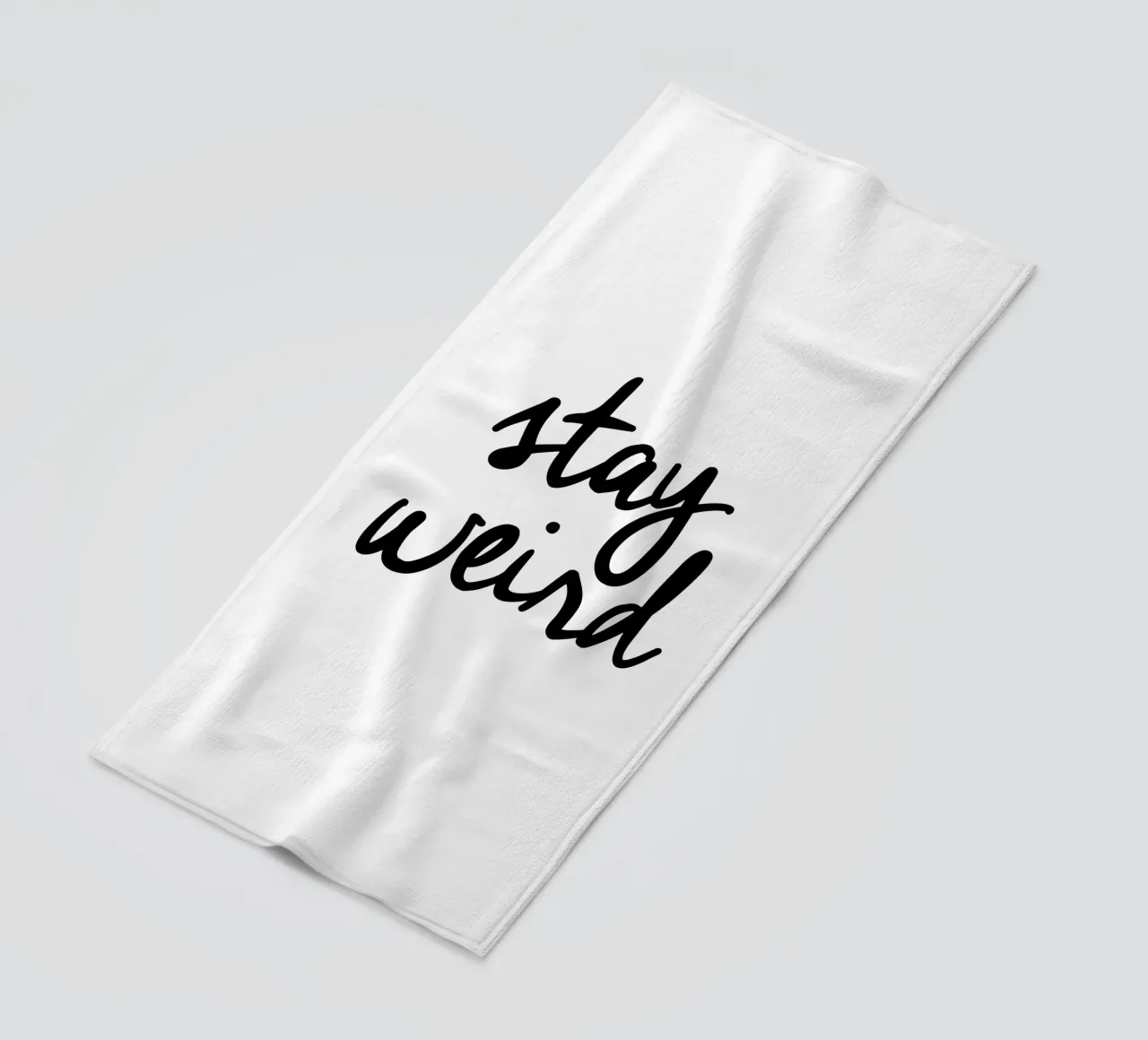 Stay Weird beach towel by THE MOTIVATED TYPE