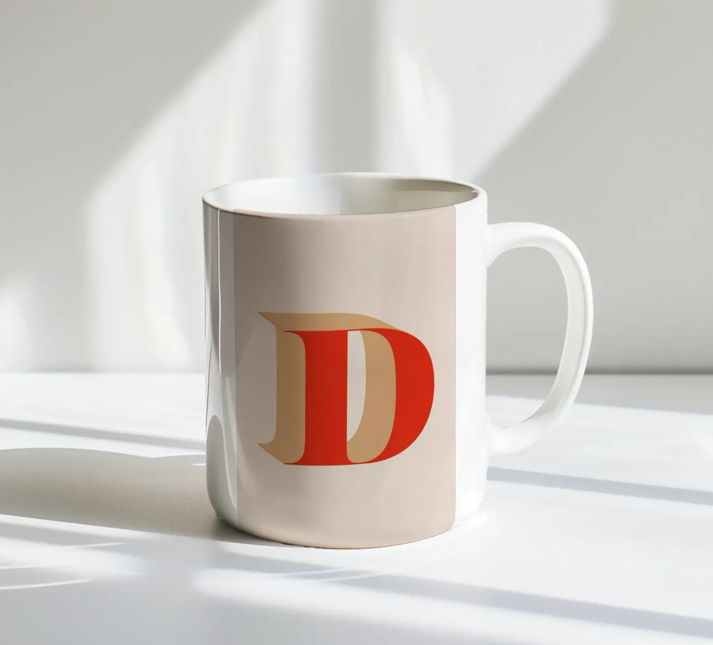 Red D ceramic mug by daylight design studio