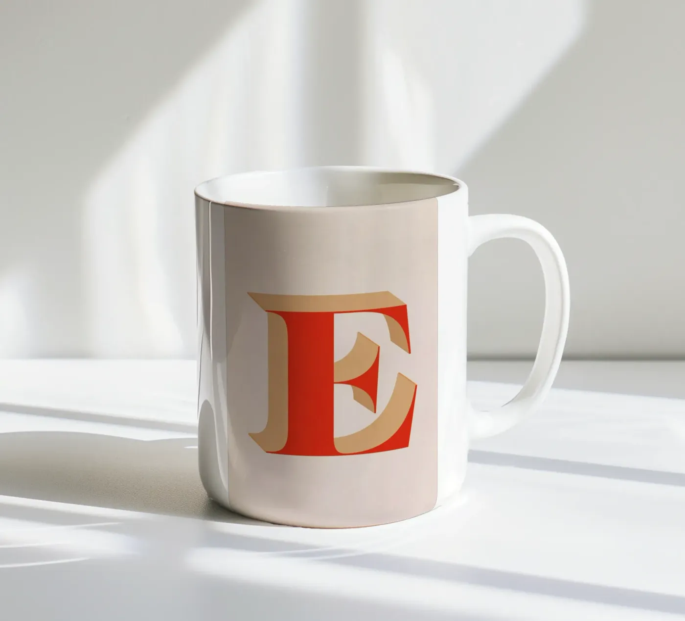 Red E ceramic mug by daylight design studio
