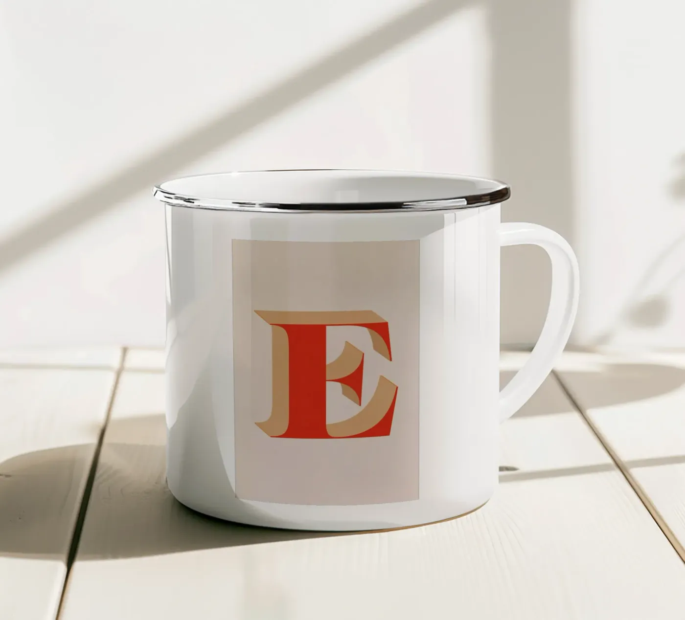 Red E enamel mug by daylight design studio