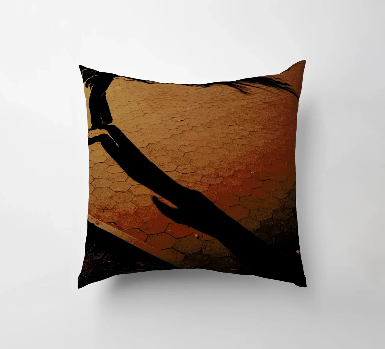 Orange decorative cushion by Philipp Reinhard