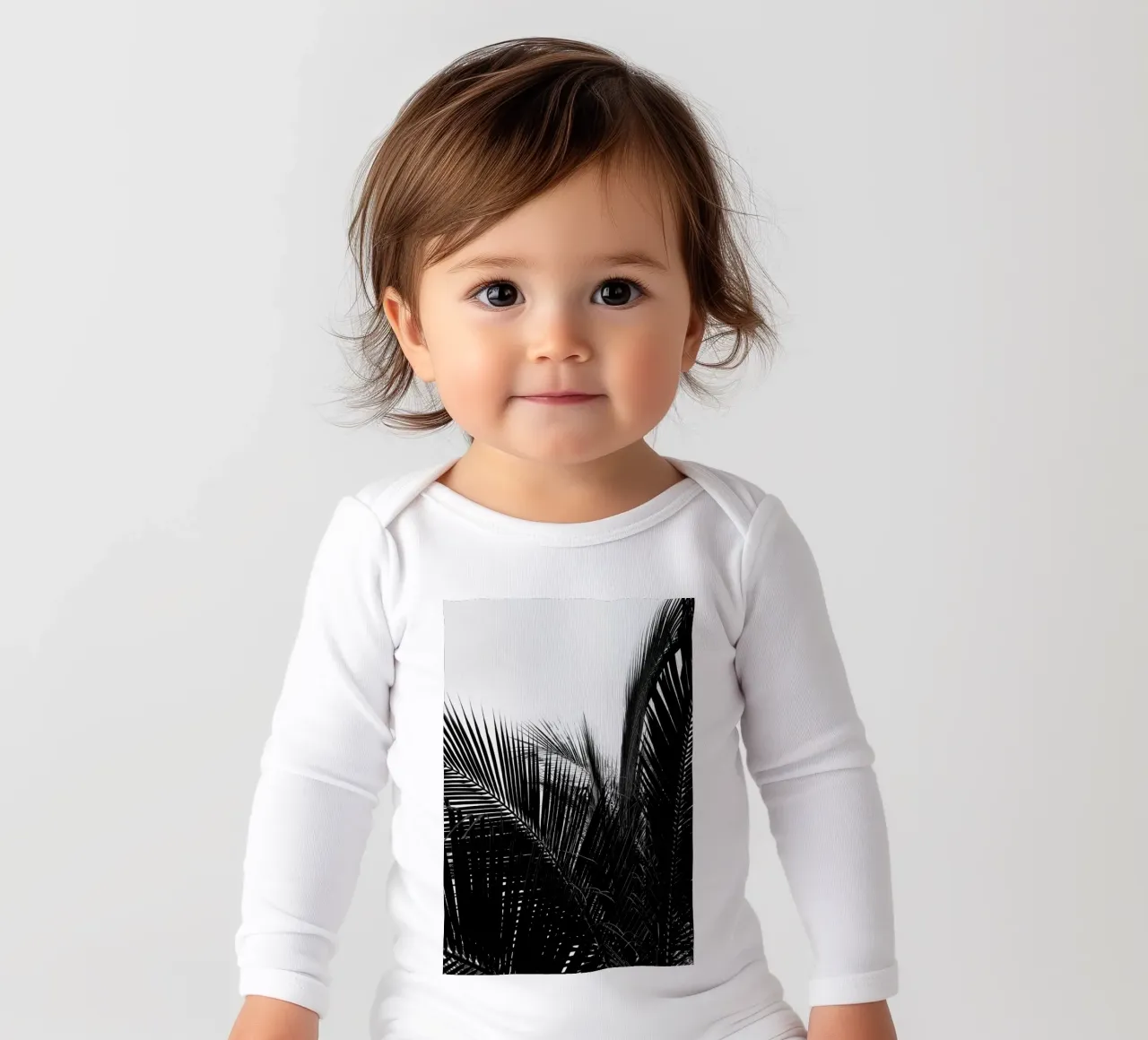 Monochrome Palm long-sleeve baby romper by Flora & Fauna