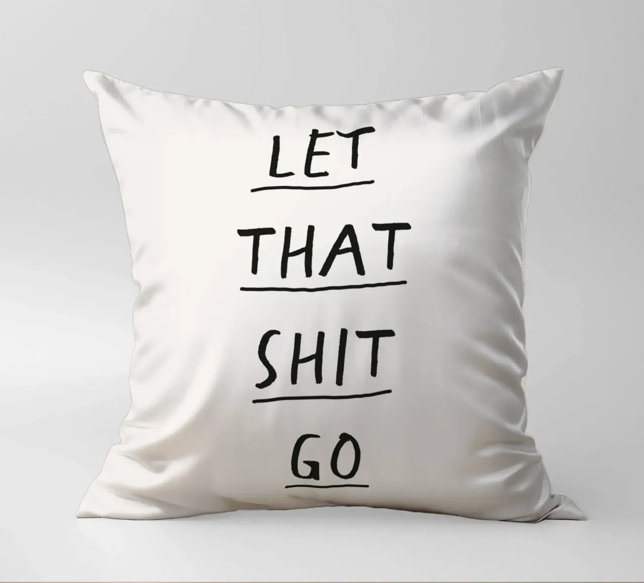 Stampa tipografica in bianco e nero di Let That Shit Go cuscino da THE MOTIVATED TYPE
