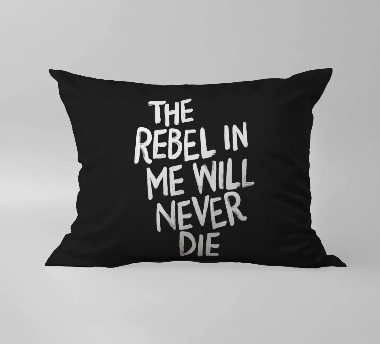 The Rebel in Me Will Never Die Black Typography Print decorative cushion by THE MOTIVATED TYPE