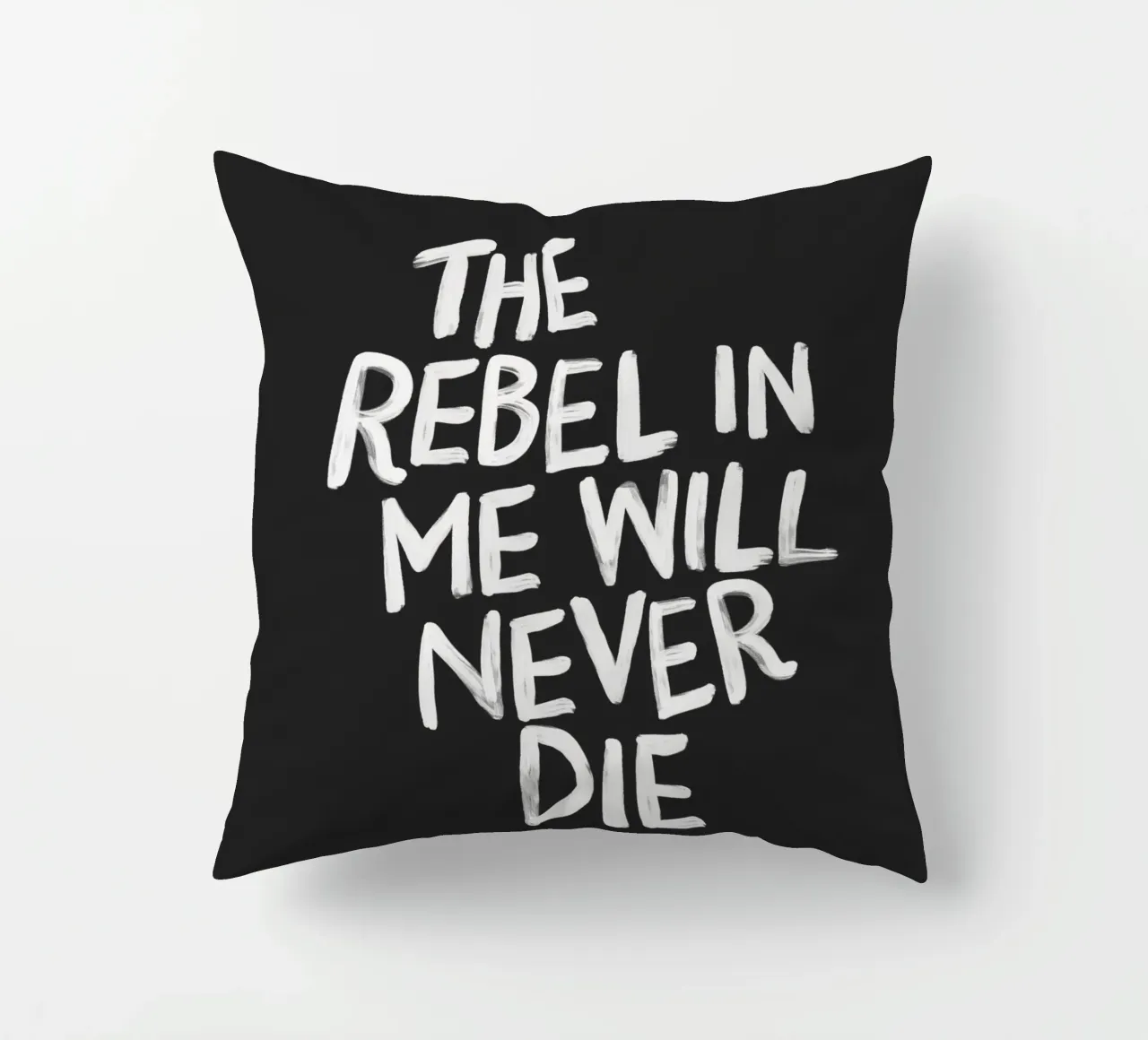 The Rebel in Me Will Never Die Black Typography Print decorative cushion by THE MOTIVATED TYPE